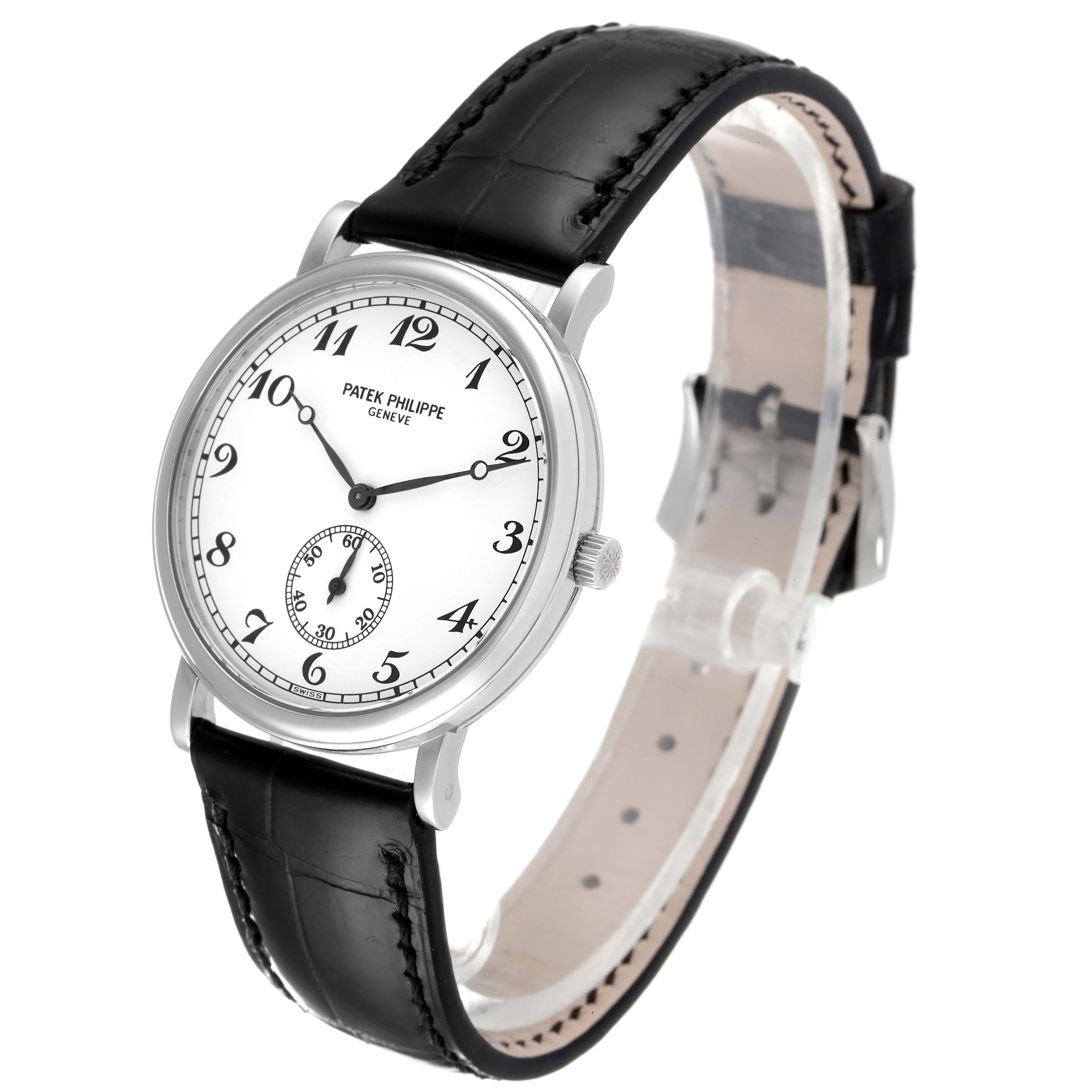 The Patek Philippe Calatrava 5022G Men's White Gold White Dial 5022G Men's White Gold White Dial watch is shown at a three-quarter angle, displaying its face, case, crown, and leather strap.