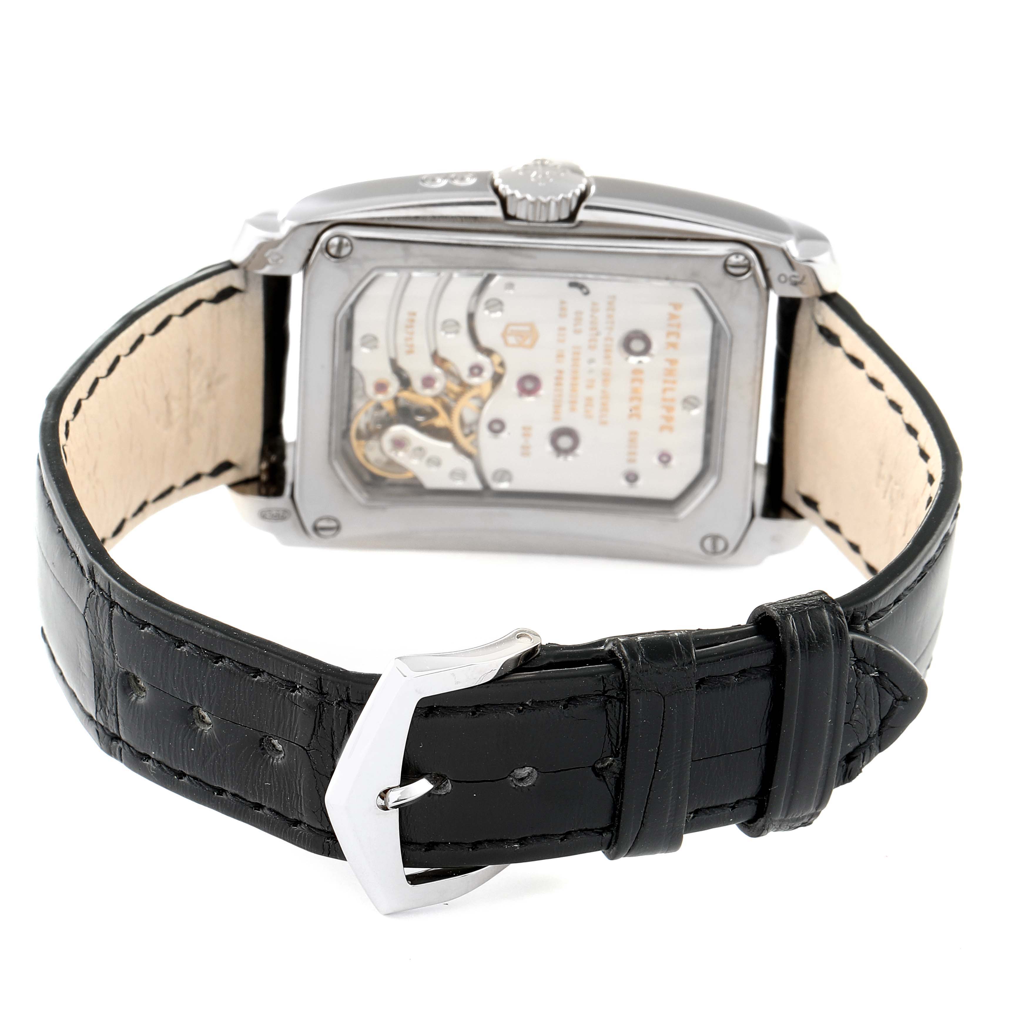 This image shows the back view of a Patek Philippe Gondolo 5200G-001 Men's White Gold Blue Dial 5200G-001 Men's White Gold Blue Dial model watch, highlighting its movement and black leather strap.