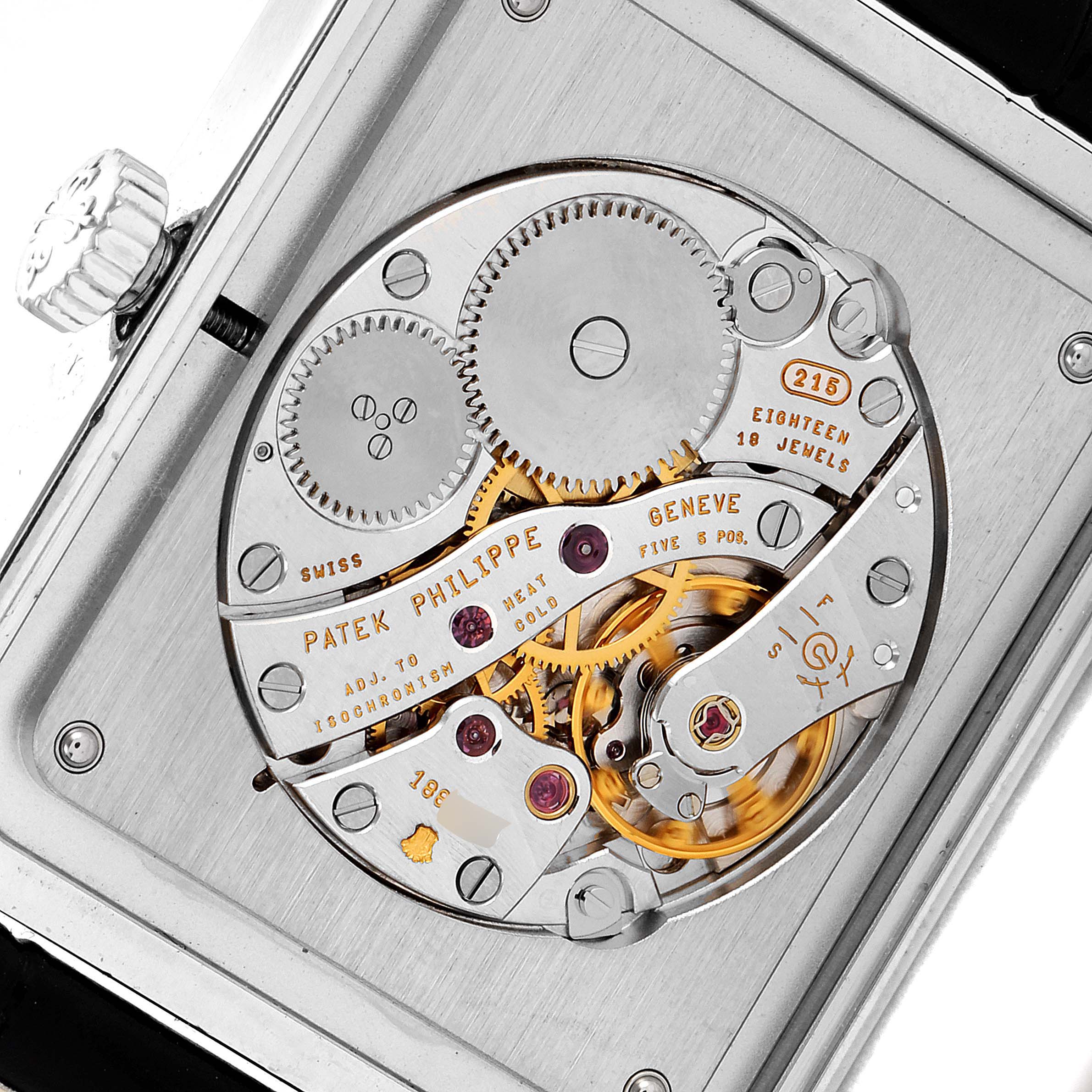 The image shows the intricate inner mechanics of a Patek Philippe Gondolo 5109G Men
s White Gold Silver Dial 5109G Men
s White Gold Silver Dial watch, viewed from the back case.