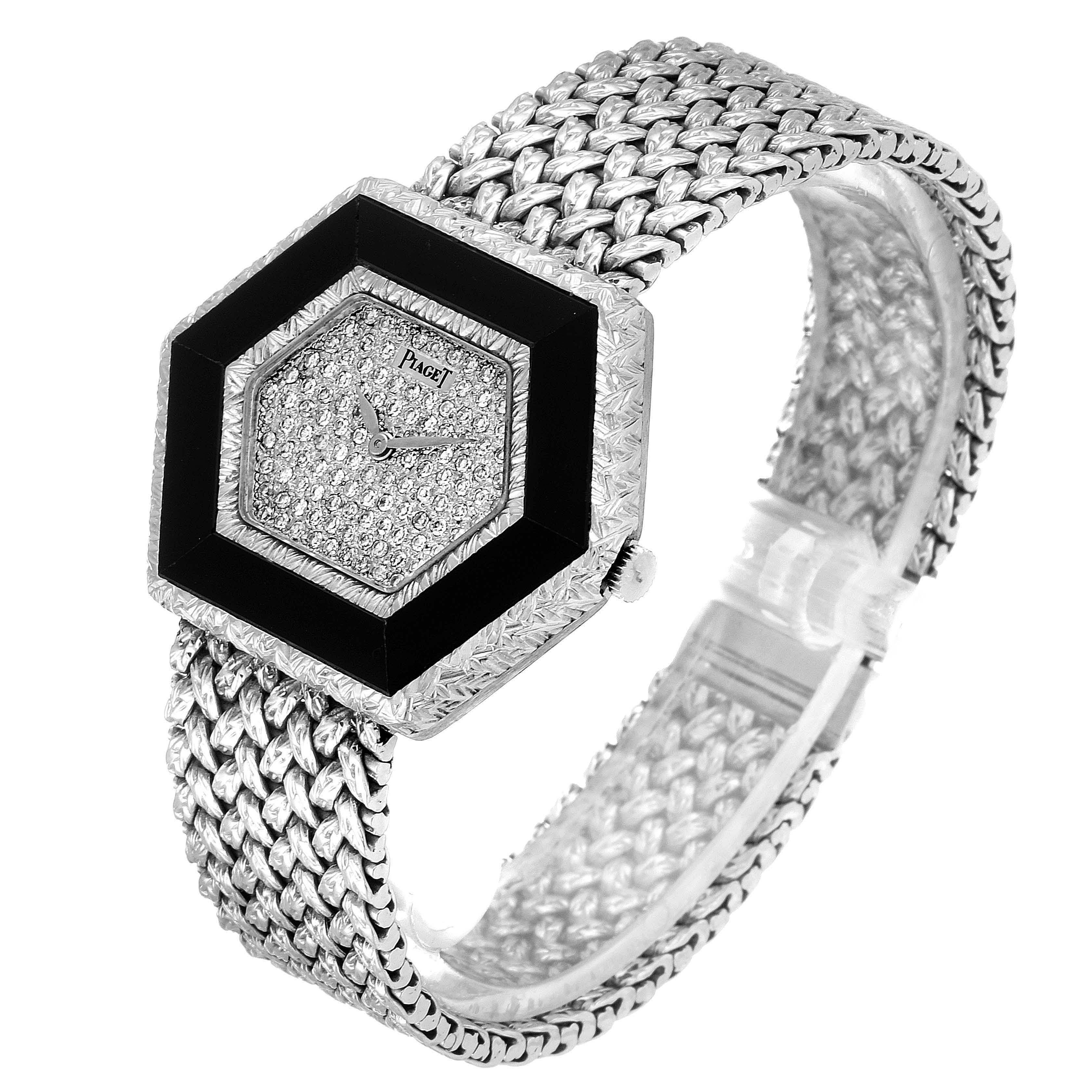 The Piaget 9523D2 Women's White Gold White Dial 9523D2 Women's White Gold White Dial Onyx Diamond Dial White Gold Vintage Cocktail Ladies Watch 9523 is shown at an angled view displaying the watch face and the band.