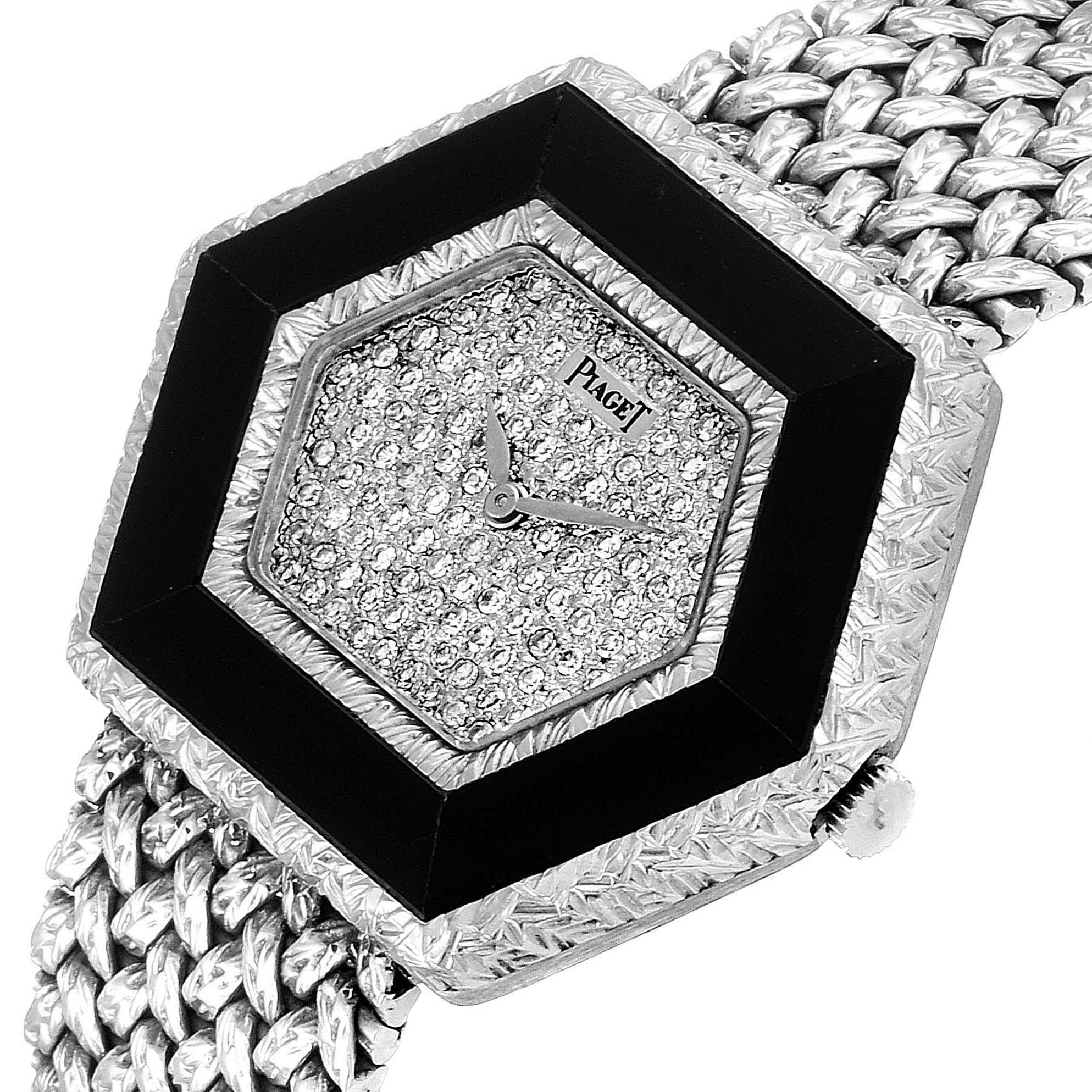 The image shows a close-up of the Piaget 9523D2 Women's White Gold White Dial 9523D2 Women's White Gold White Dial Onyx Diamond Dial White Gold Vintage Cocktail Ladies Watch 9523, featuring its dial and part of the band.