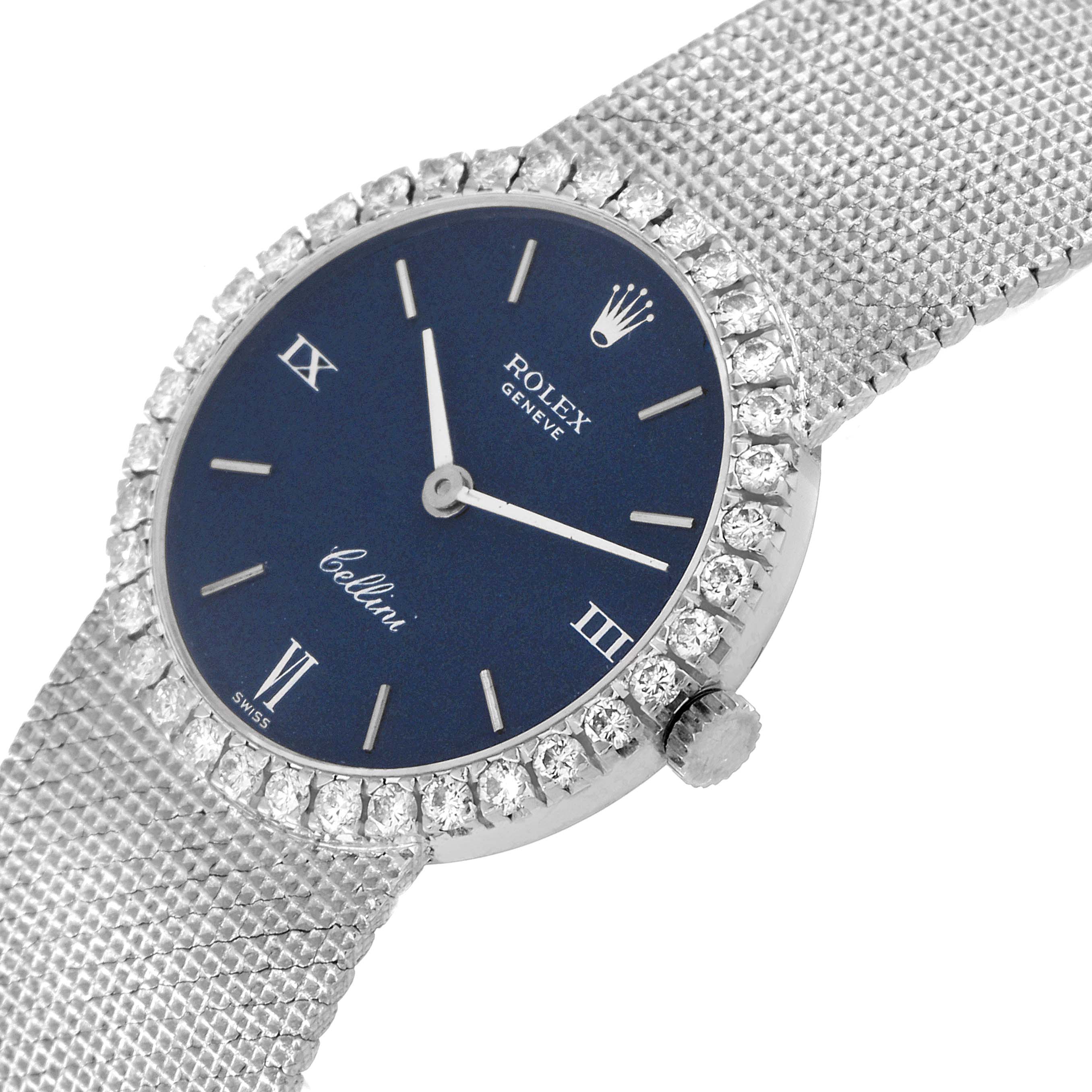The image shows a close-up angled view of the Rolex Cocktail 3812 Women
s White Gold Blue Dial 3812 Women
s White Gold Blue Dial model, highlighting the watch face, bezel, and part of the bracelet.