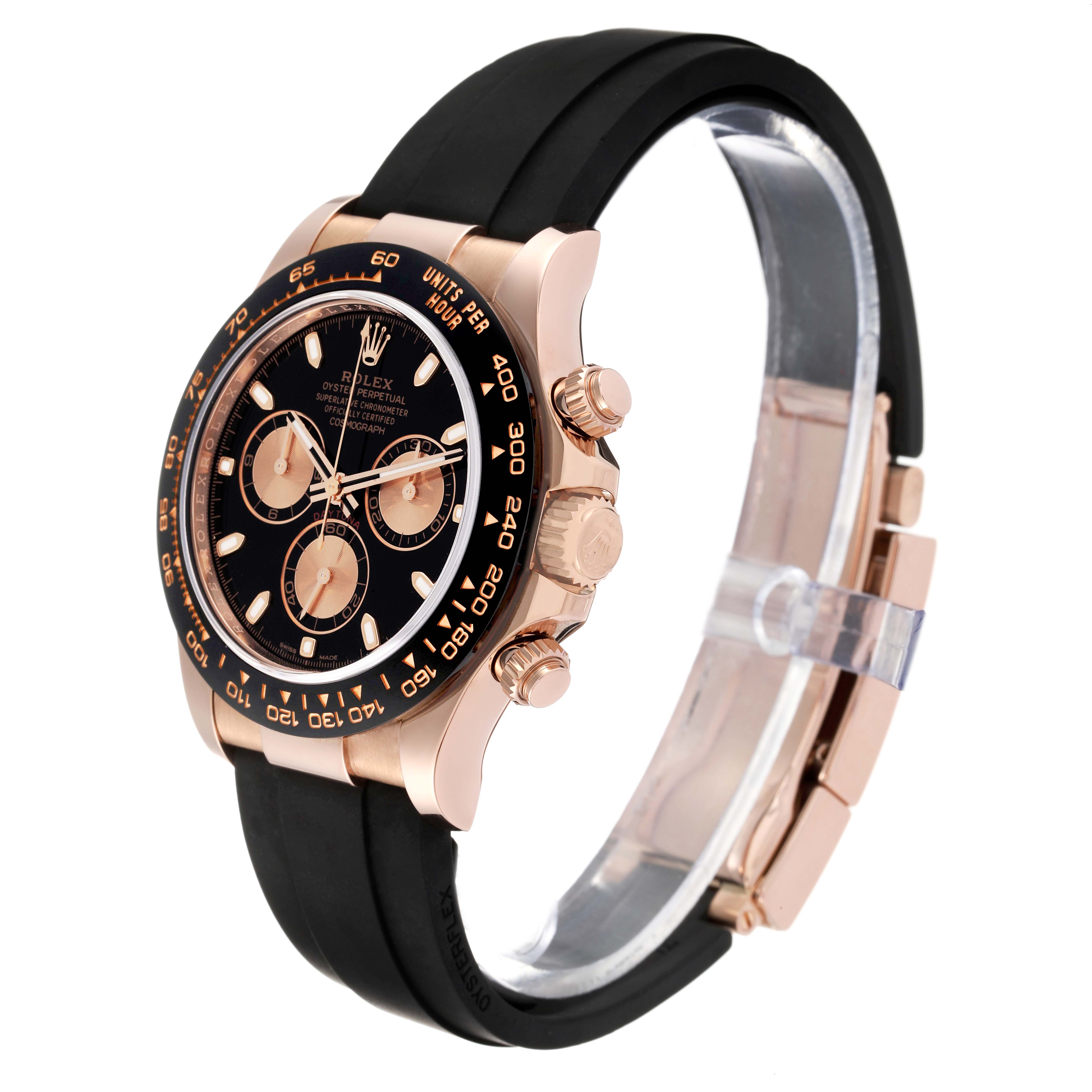 The image shows a Rolex Daytona 116515LN Men
s Rose Gold Silver Dial 116515LN Men
s Rose Gold Silver Dial watch at a three-quarter angle, highlighting the black dial, gold case, and black rubber strap.
