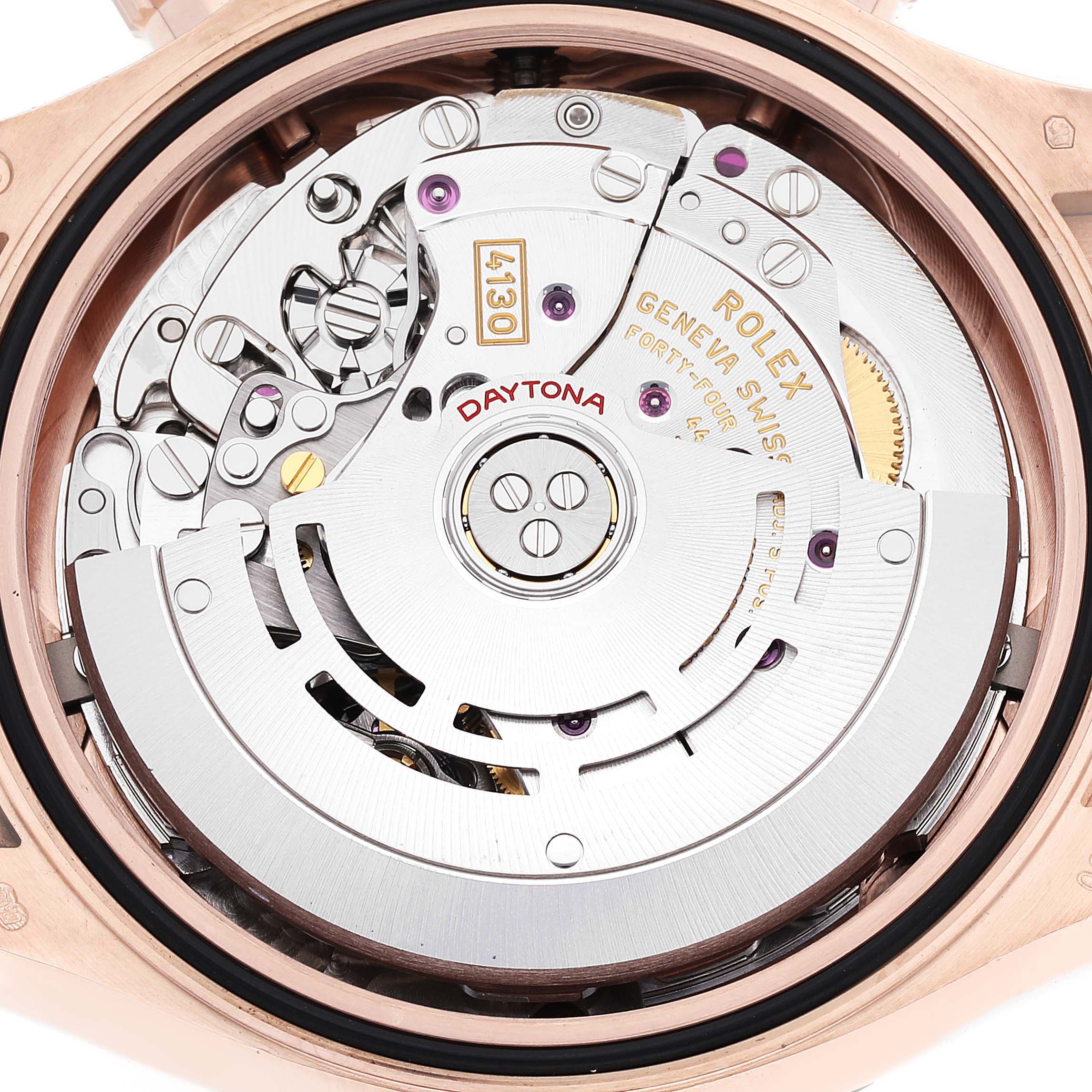 This image shows the movement and intricate mechanisms of a Rolex Daytona 116515LN Men
s Rose Gold Silver Dial 116515LN Men
s Rose Gold Silver Dial watch from a back angle.