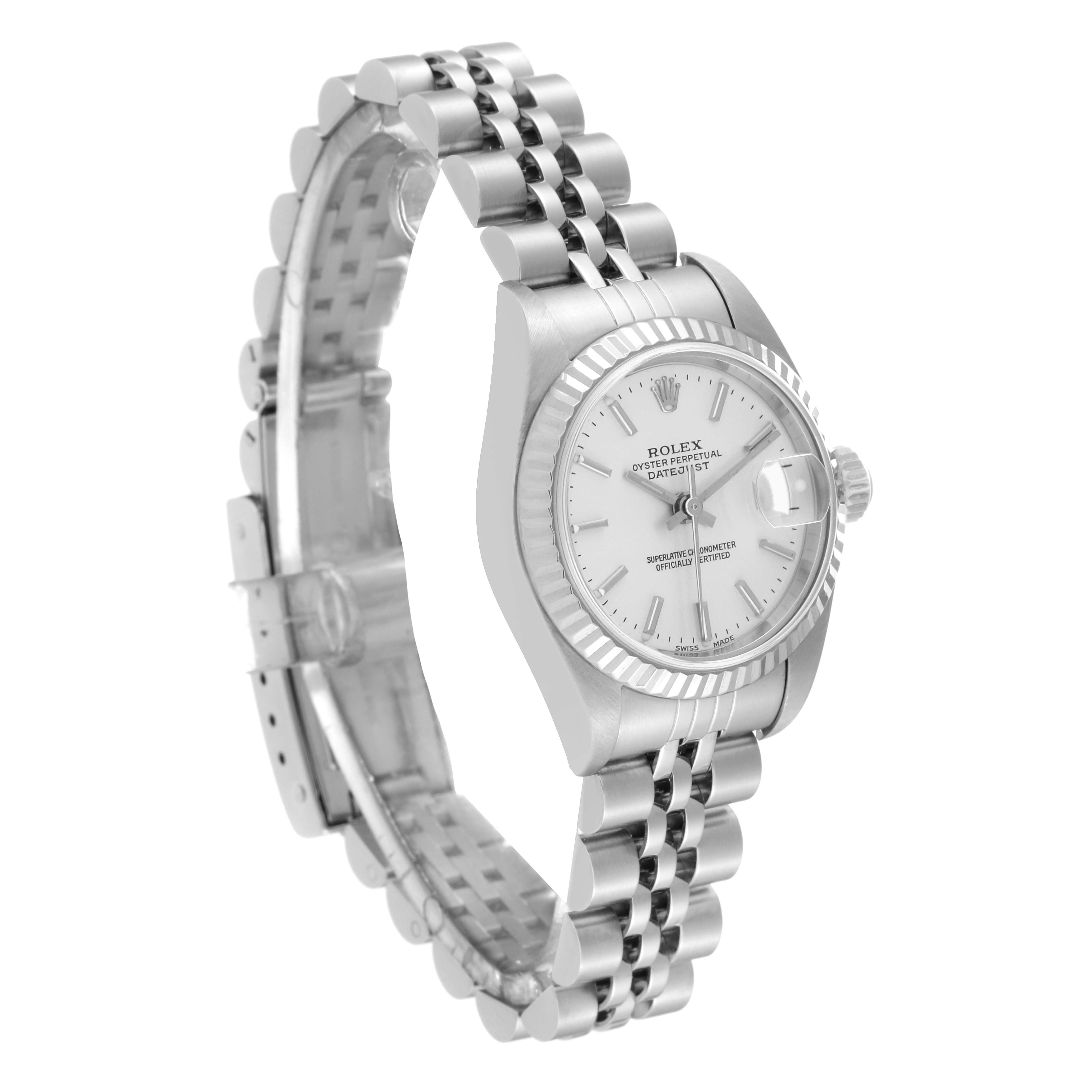 The Rolex Datejust 79174 Women's Stainless Steel Silver Dial 79174 Women's Stainless Steel Silver Dial watch is shown at a 3/4 angle, displaying its face, fluted bezel, and Jubilee bracelet.