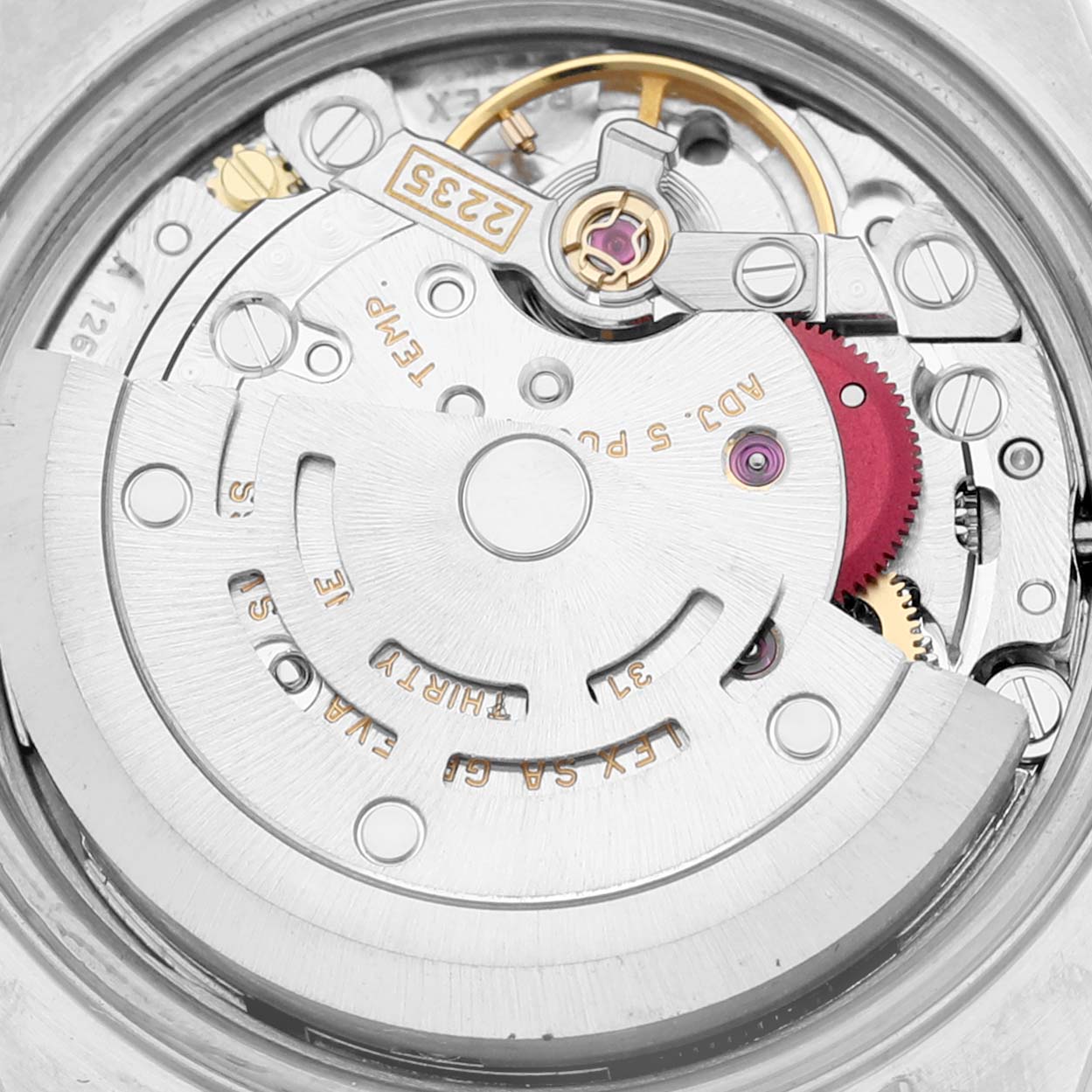 This image shows a close-up view of the movement mechanism inside a Rolex Datejust 79174 Women's Stainless Steel Silver Dial 79174 Women's Stainless Steel Silver Dial watch.