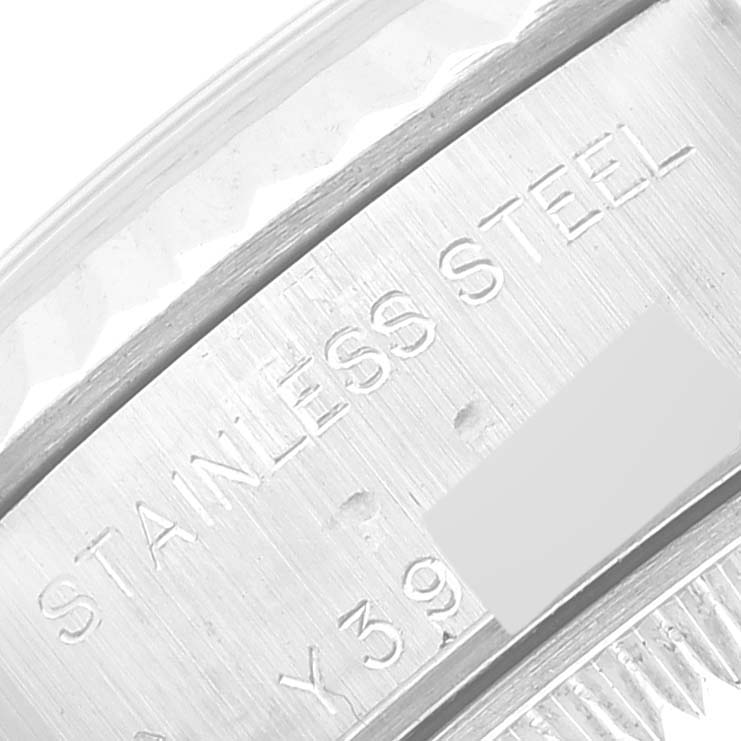 This image shows a close-up view of the stainless steel engraving on the Rolex Datejust 79174 Women's Stainless Steel Silver Dial 79174 Women's Stainless Steel Silver Dial watch case.
