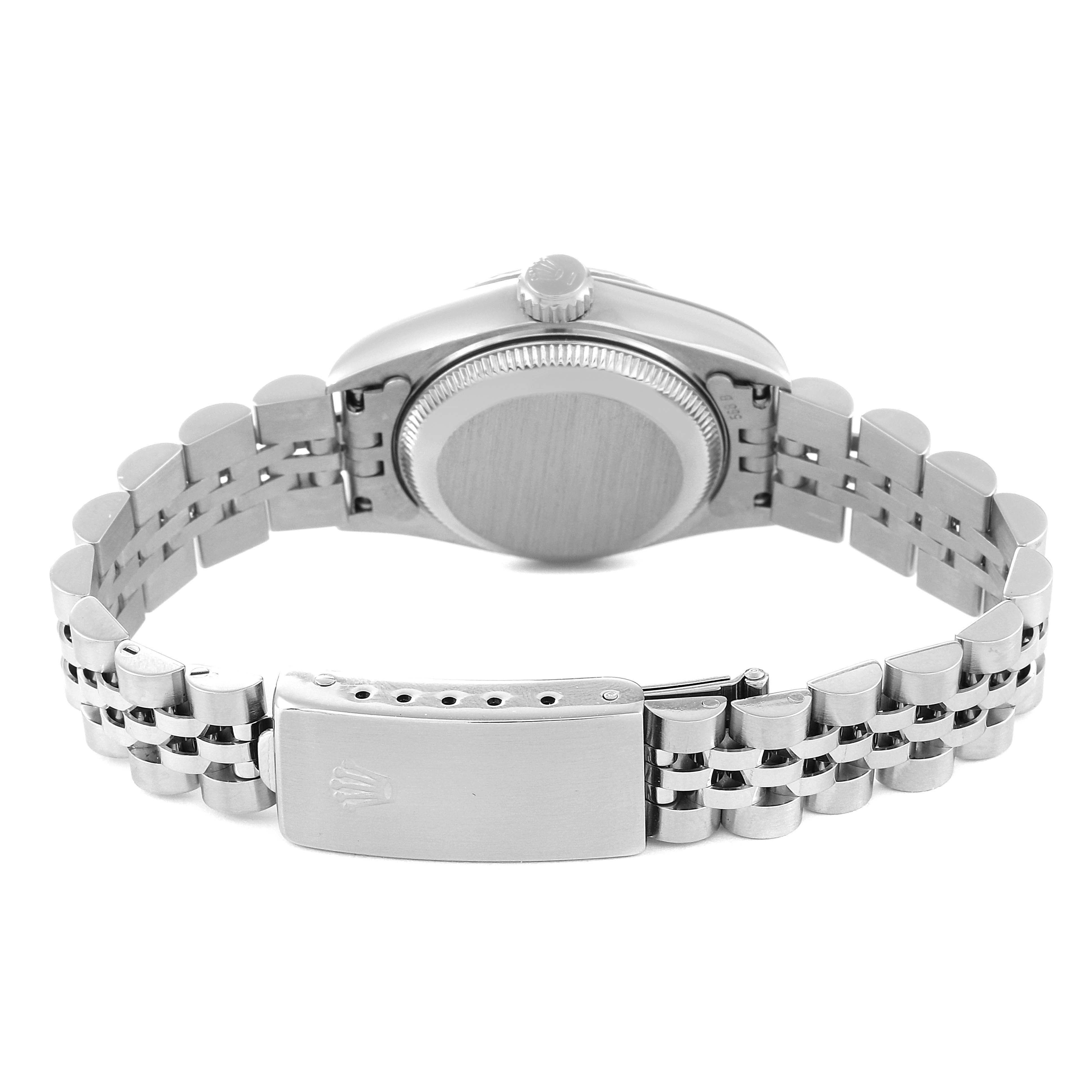 This image shows the back side and clasp of a Rolex Datejust 69174 Women's Stainless Steel Black Dial 69174 Women's Stainless Steel Black Dial watch, along with part of the bracelet.