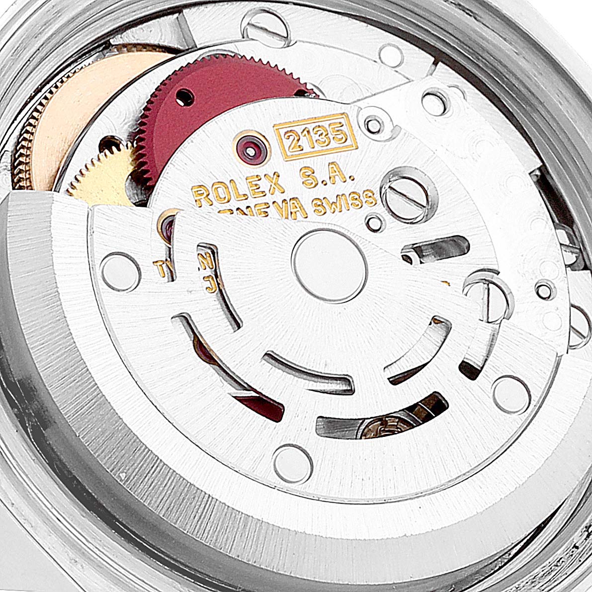 This is a close-up view of the internal mechanism of a Rolex Datejust 69174 Women's Stainless Steel Black Dial 69174 Women's Stainless Steel Black Dial watch, showcasing its intricate movement parts.