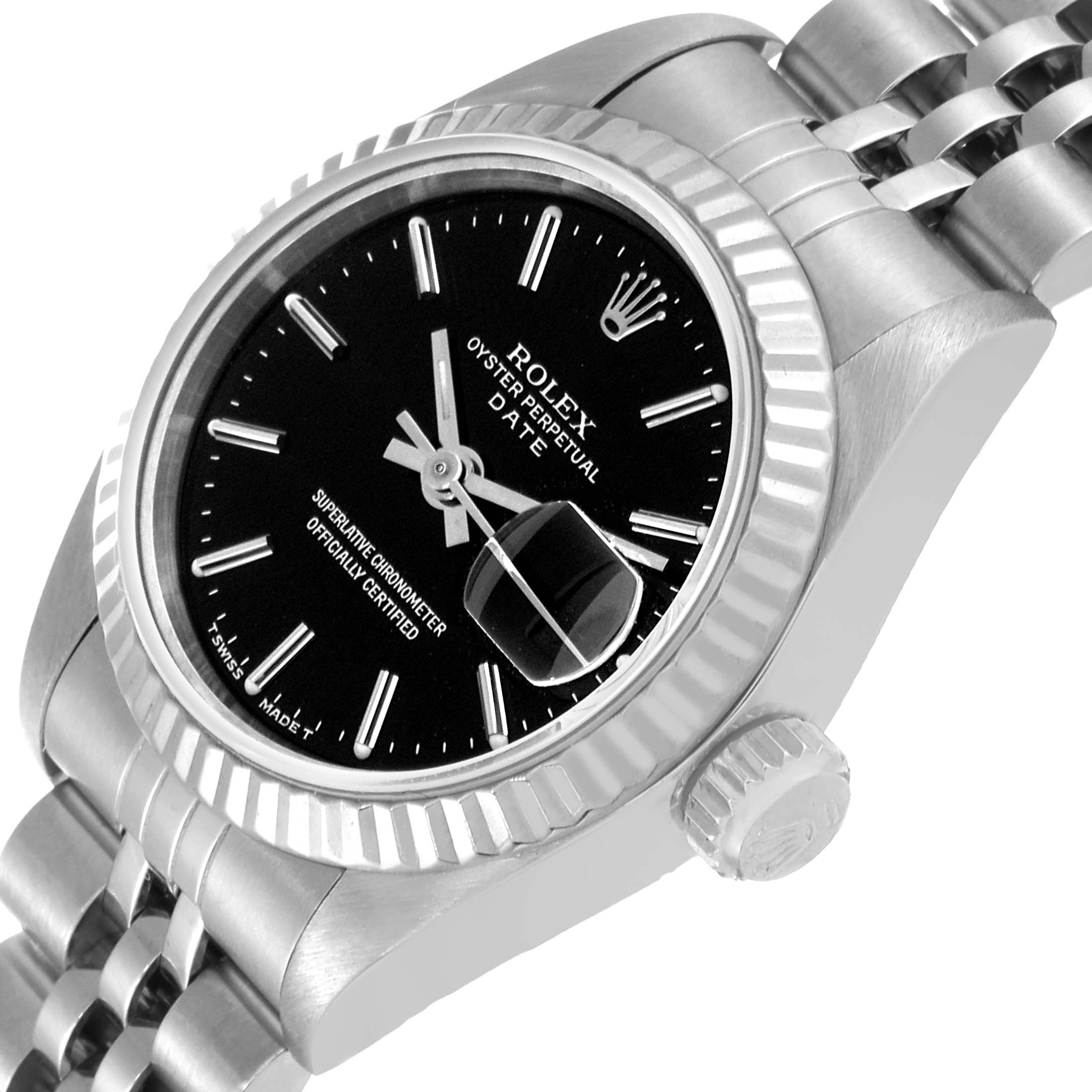 This image shows a Rolex Datejust 69174 Women's Stainless Steel Black Dial 69174 Women's Stainless Steel Black Dial watch at a slight angle, highlighting its black dial, fluted bezel, crown, and part of the bracelet.