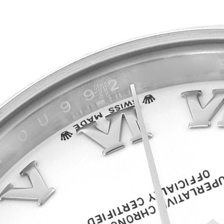 The image shows a close-up of the Rolex Datejust 279160 Women's Stainless Steel White Dial 279160 Women's Stainless Steel White Dial watch face highlighting Roman numerals, part of the bezel, and the "Swiss Made" text.