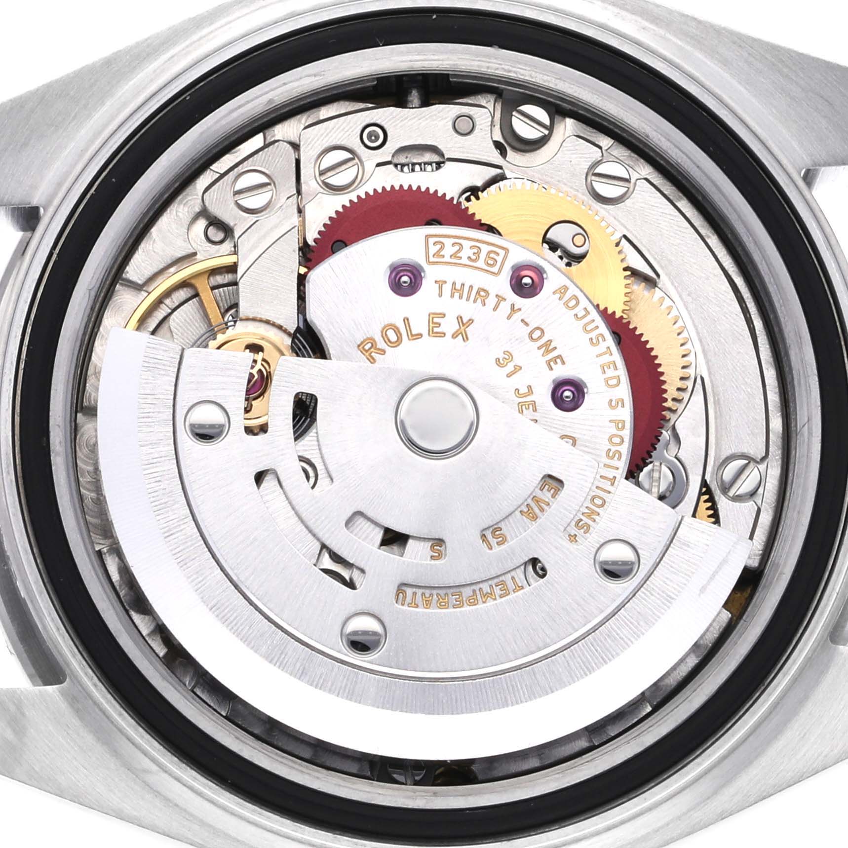 The image shows the movement of a Rolex Datejust 279160 Women's Stainless Steel White Dial 279160 Women's Stainless Steel White Dial watch from a back angle, highlighting gears and the rotor.