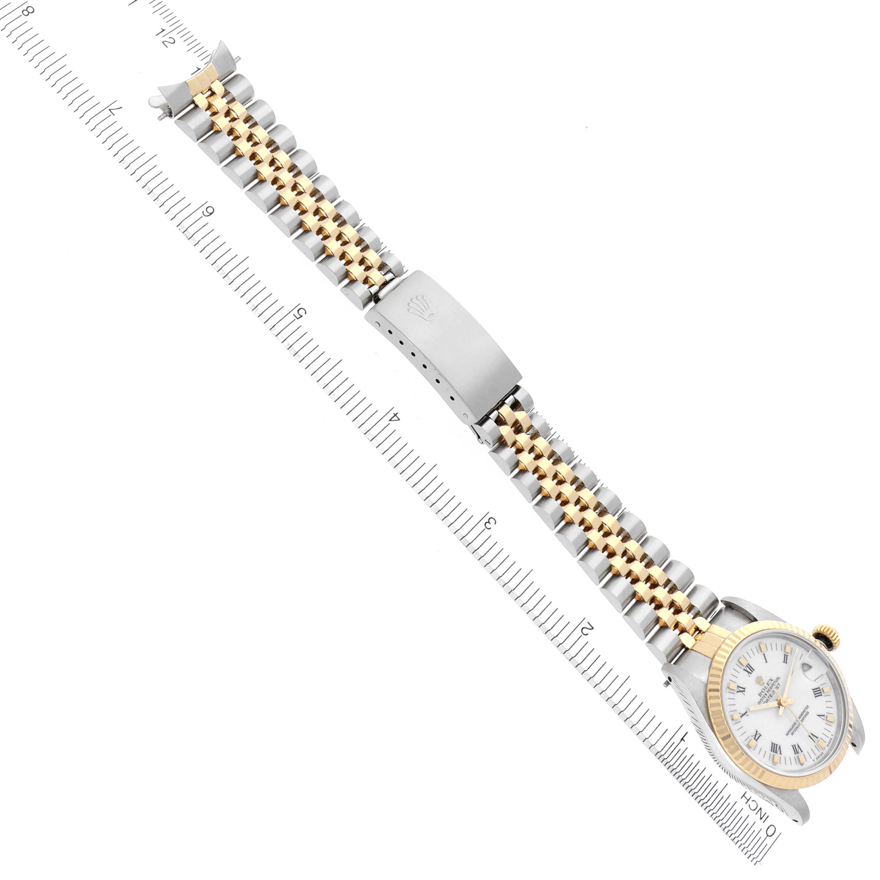 The image shows a Rolex Mid-Size 68273 Women's Steel and Gold (two tone) White Dial 68273 Women's Steel and Gold (two tone) White Dial watch at a diagonal angle, highlighting the full band, clasp, and watch face.