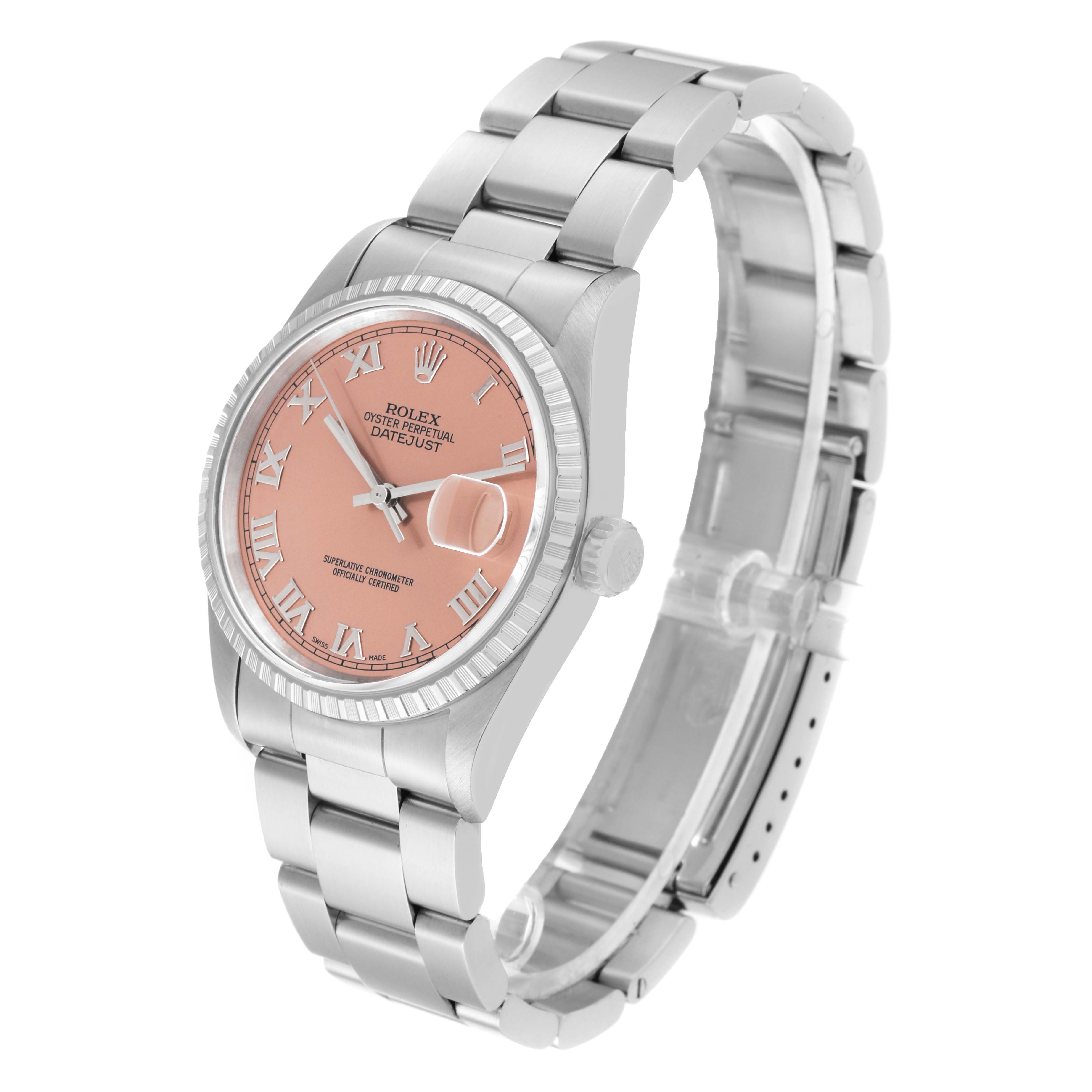 The image shows a side angle of a Rolex Datejust 16220 Men's Stainless Steel Pink Dial 16220 Men's Stainless Steel Pink Dial watch displaying its pink dial, fluted bezel, and stainless steel bracelet.