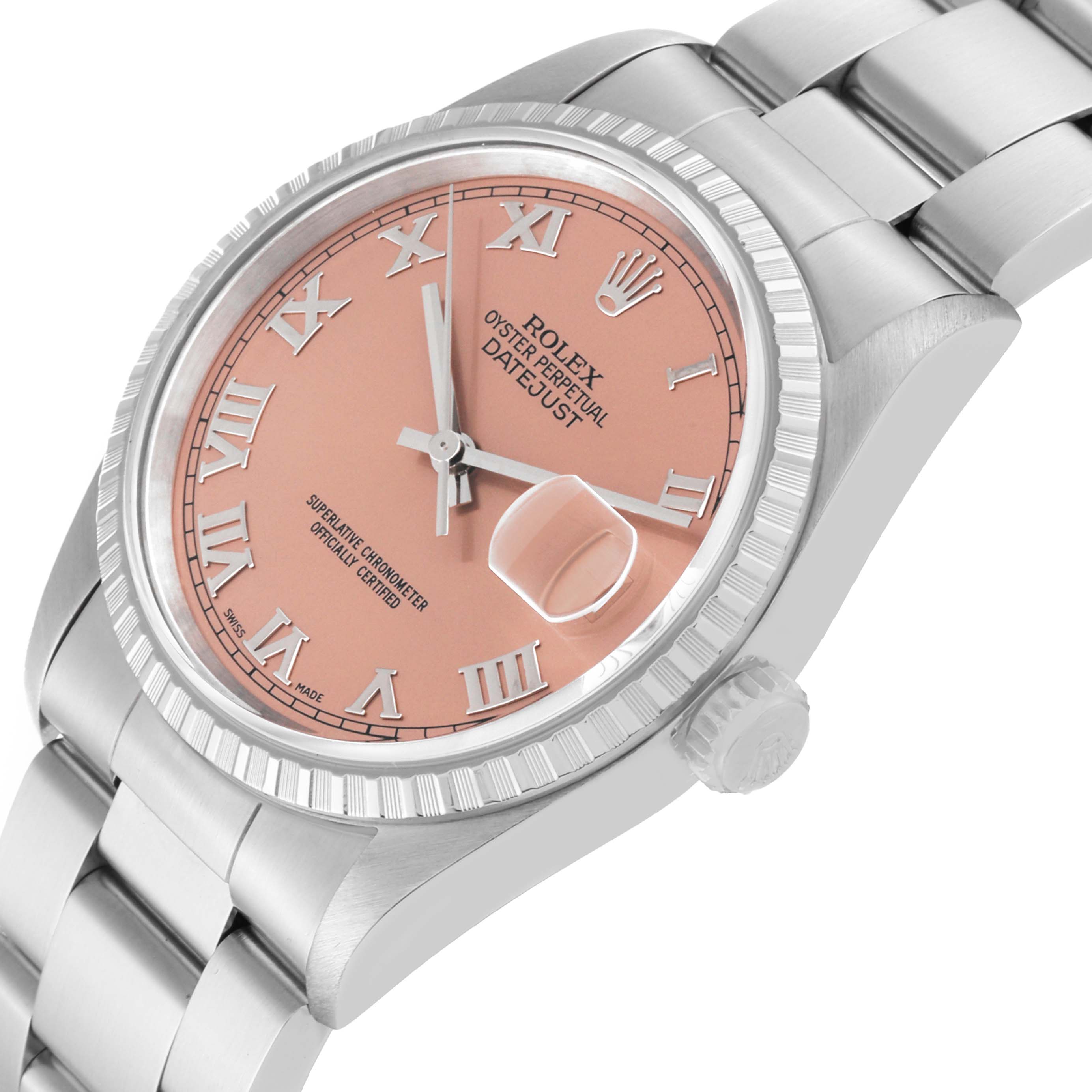 This is an angled close-up of a Rolex Datejust 16220 Men's Stainless Steel Pink Dial 16220 Men's Stainless Steel Pink Dial watch showcasing its dial, bezel, crown, and part of the bracelet.