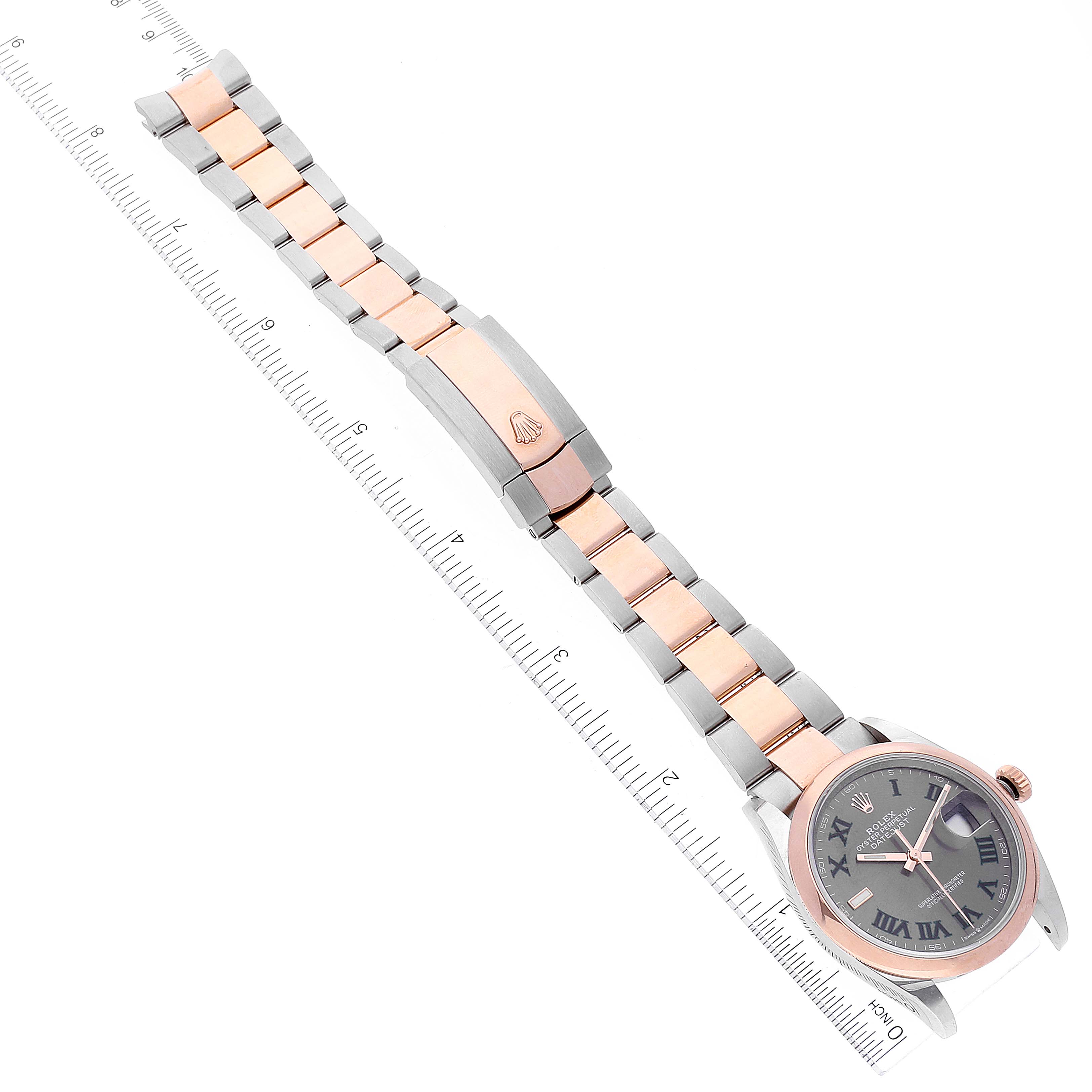 This image shows a side-angle view of a Rolex Datejust 126201 Men's Steel and Gold (two tone) Grey Dial 126201 Men's Steel and Gold (two tone) Grey Dial watch, highlighting the face, bezel, and two-tone metal bracelet.