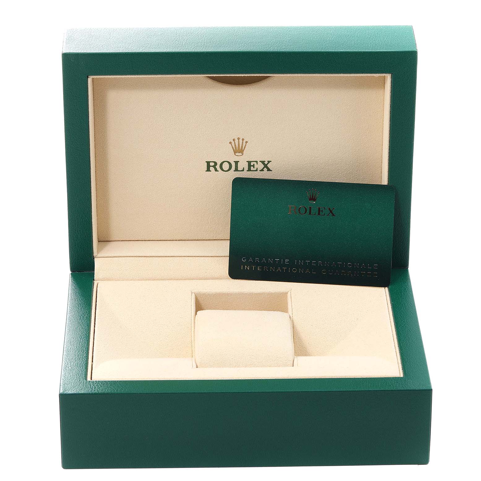 The image shows the open box of a Datejust Rolex watch, displaying its cushion and international guarantee card.