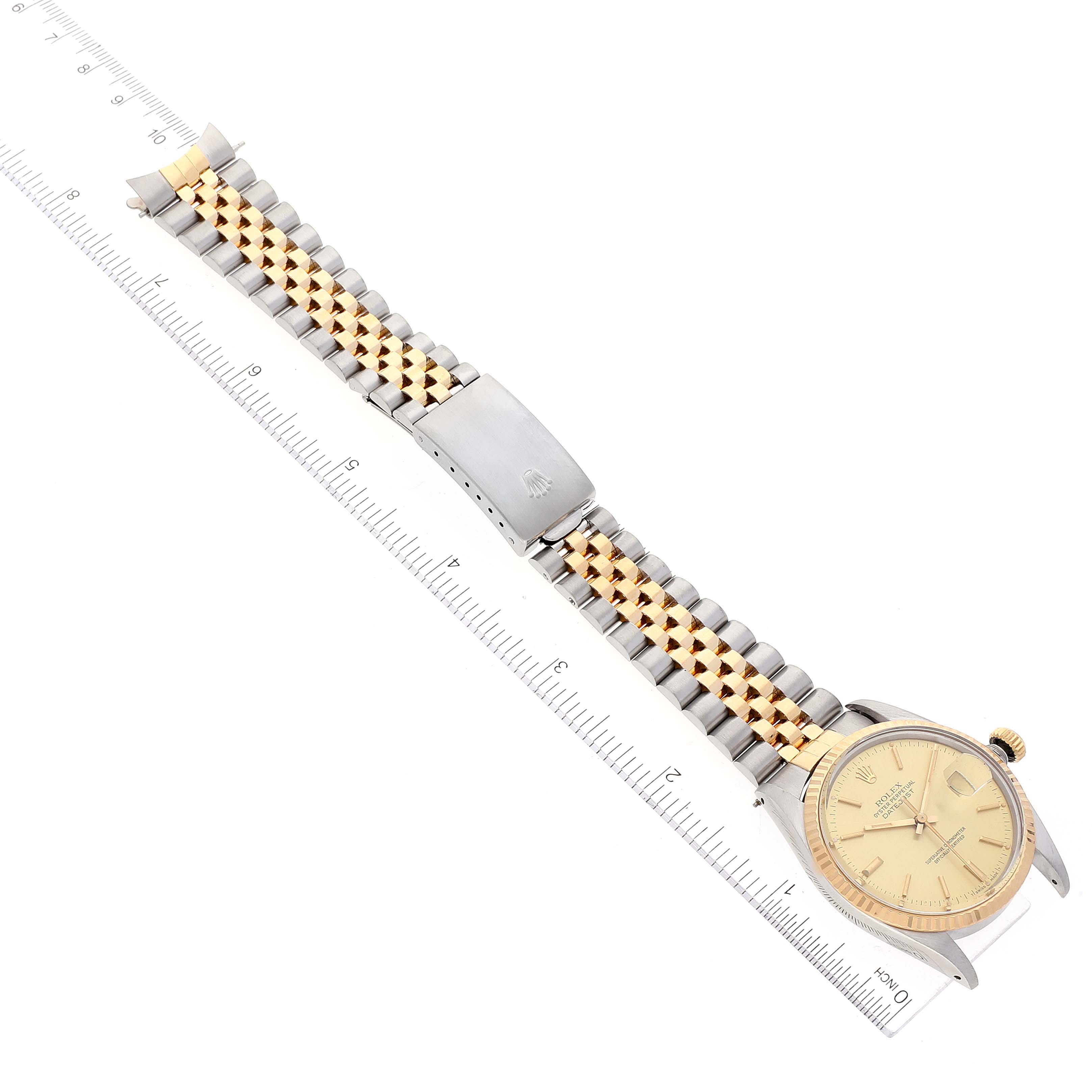 The image shows an overhead view of the Rolex Vintage Collection 16013 Men's Steel and Gold (two tone) Champagne Dial 16013 Men's Steel and Gold (two tone) Champagne Dial watch, including the face, bracelet, and clasp.