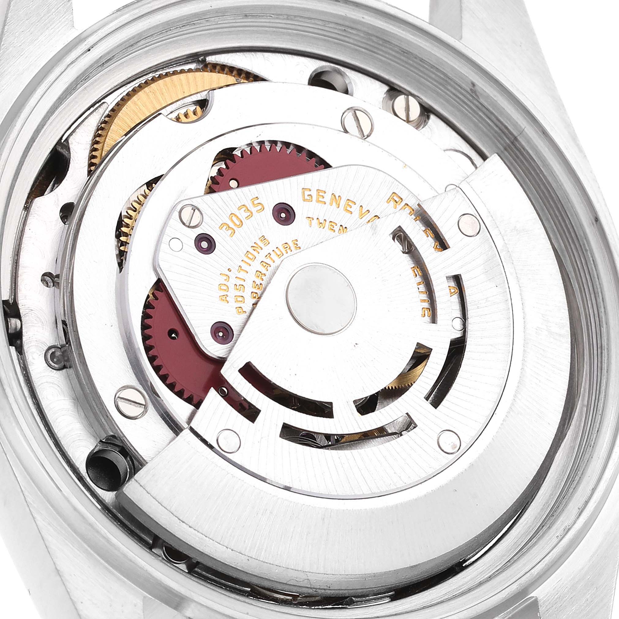The image shows the internal mechanism of a Vintage Collection Rolex watch with a focus on the movement components.