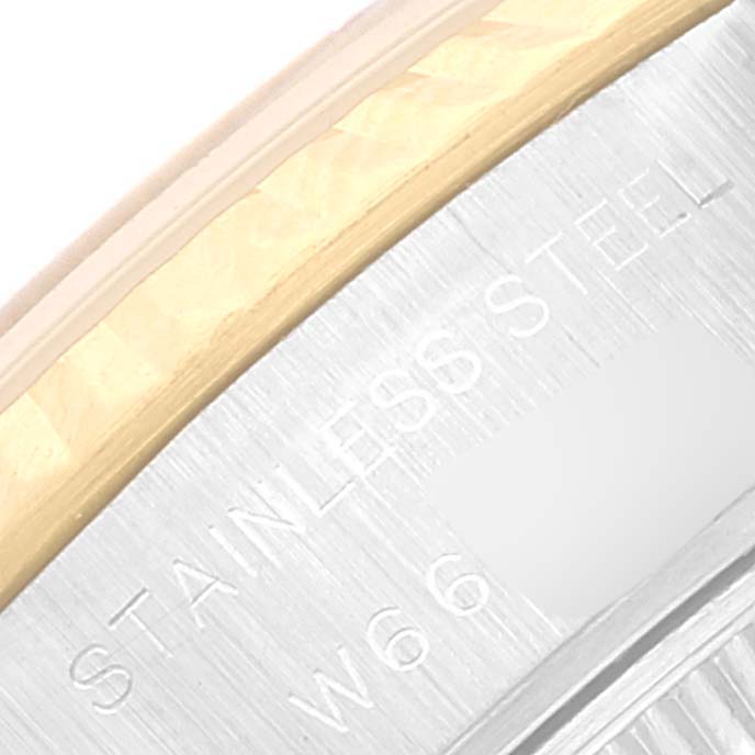The image shows a close-up of the engraved case back edge of a Rolex Datejust 69173 Women's Steel and Gold (two tone) Champagne Dial 69173 Women's Steel and Gold (two tone) Champagne Dial watch, highlighting "STAINLESS STEEL" text.