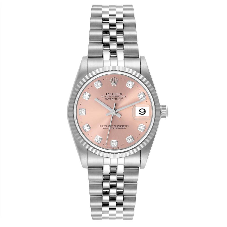 The Rolex Mid-Size watch is shown from a top-down angle, displaying the face, bezel, and bracelet in full detail.