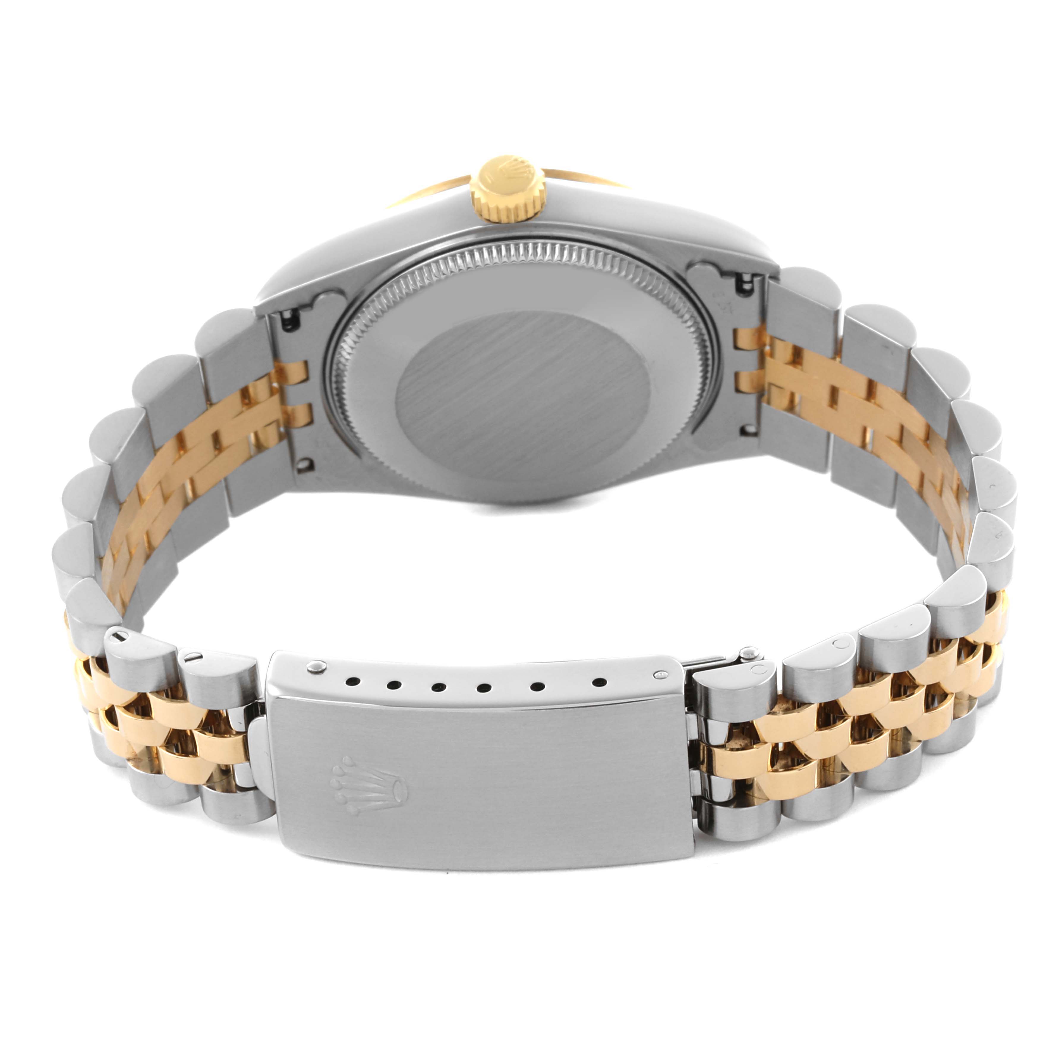 The image shows the back and clasp of a Rolex Mid-Size 68273 Women's Steel and Gold (two tone) Champagne Dial 68273 Women's Steel and Gold (two tone) Champagne Dial watch, featuring a two-tone metal bracelet.