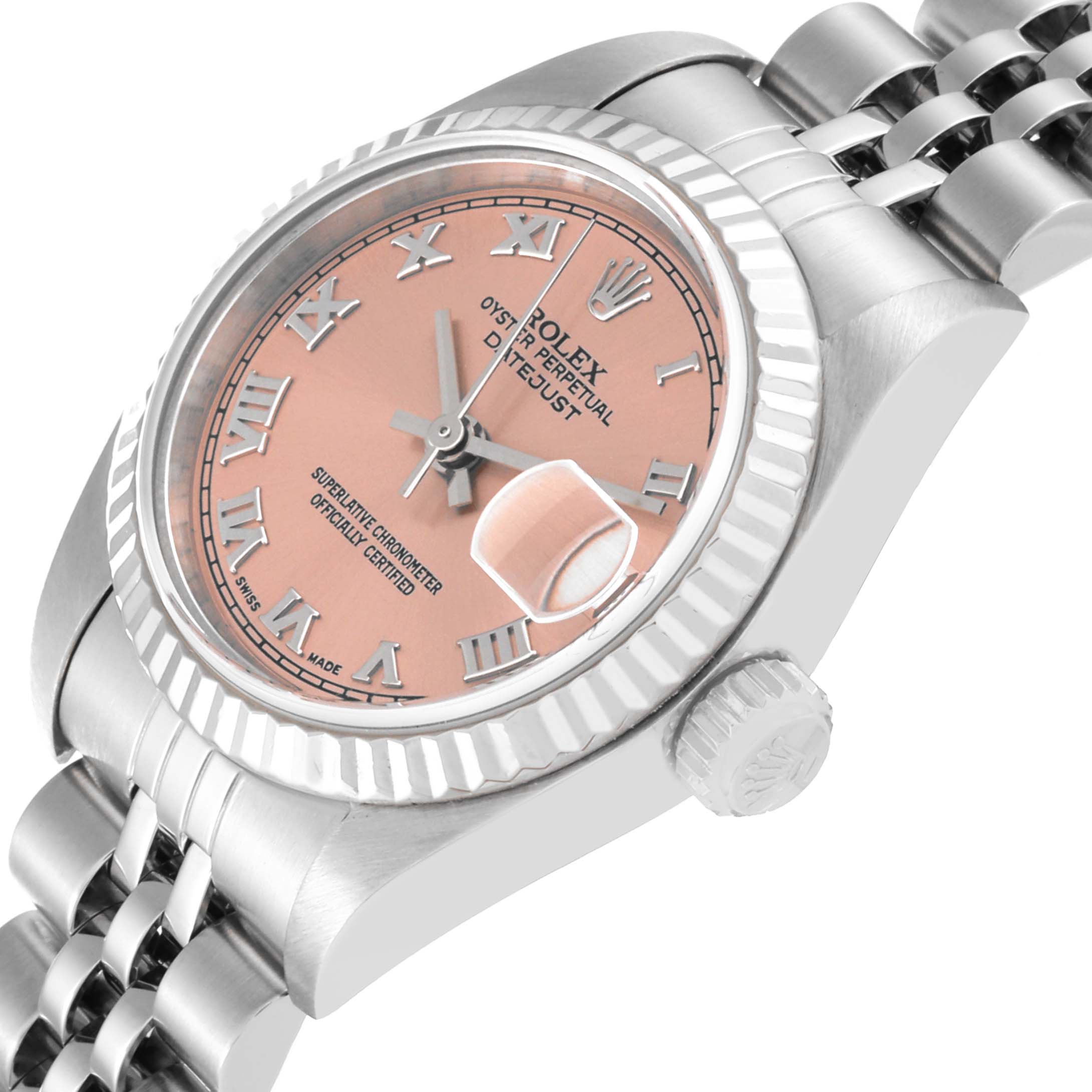 This image shows a Rolex Datejust 79174 Women's Stainless Steel Pink Dial 79174 Women's Stainless Steel Pink Dial watch viewed at a slight angle, highlighting the face, bezel, crown, and part of the bracelet.