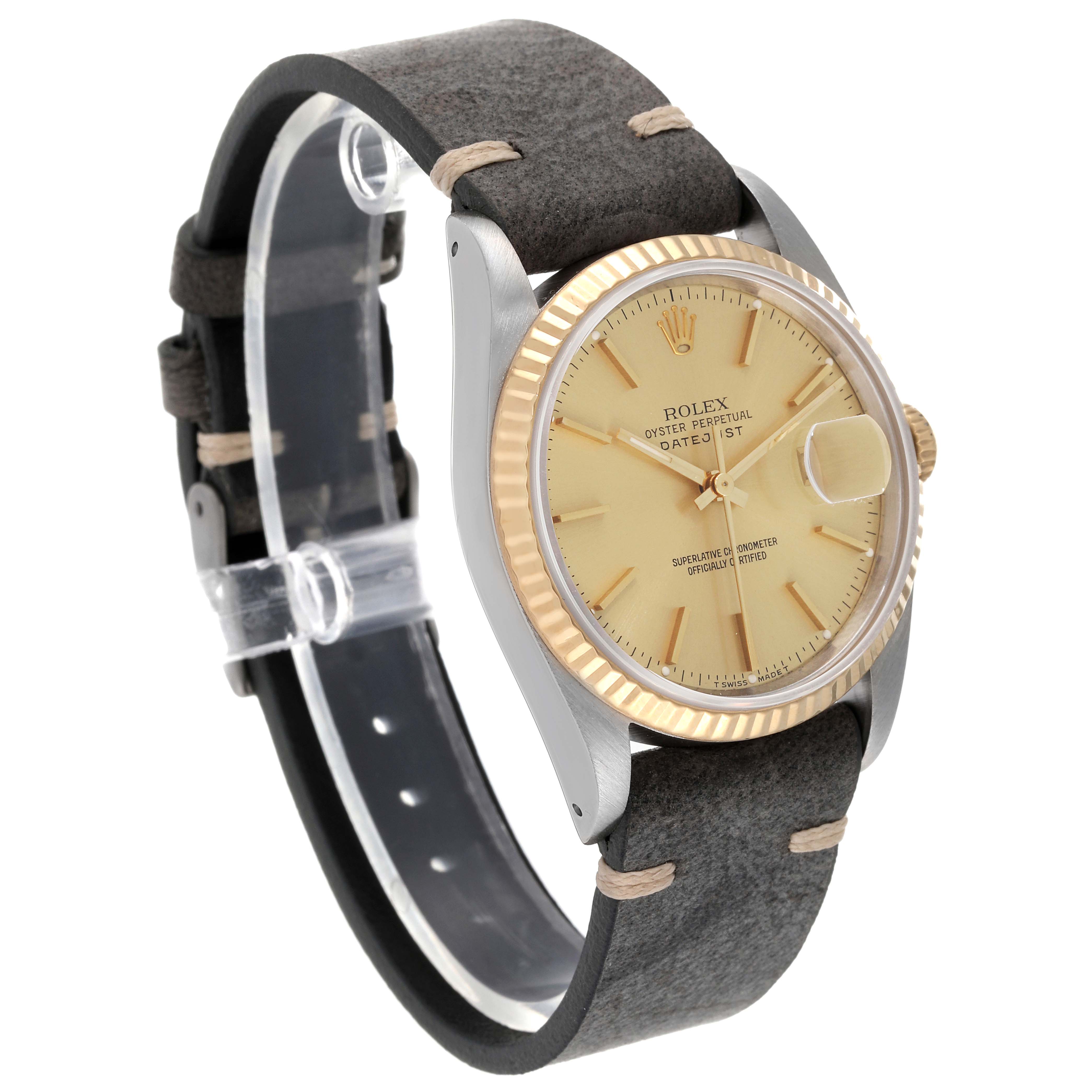 The image shows a Rolex Datejust 16233 Men's Steel and Gold (two tone) Champagne Dial 16233 Men's Steel and Gold (two tone) Champagne Dial watch from a three-quarter angle, highlighting its face, bezel, and leather strap.