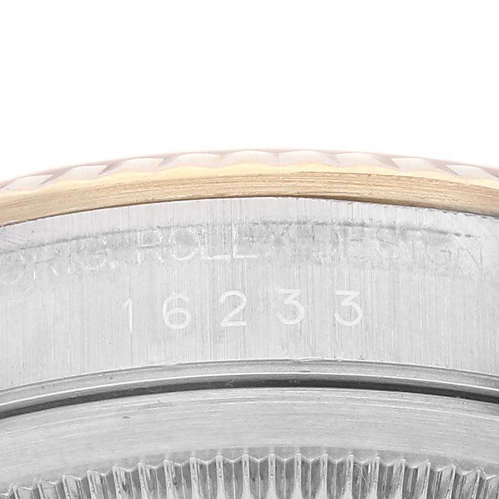 The image shows a close-up angle of the model number 16233 engraved on the case of a Rolex Datejust 16233 Men's Steel and Gold (two tone) Champagne Dial 16233 Men's Steel and Gold (two tone) Champagne Dial watch.