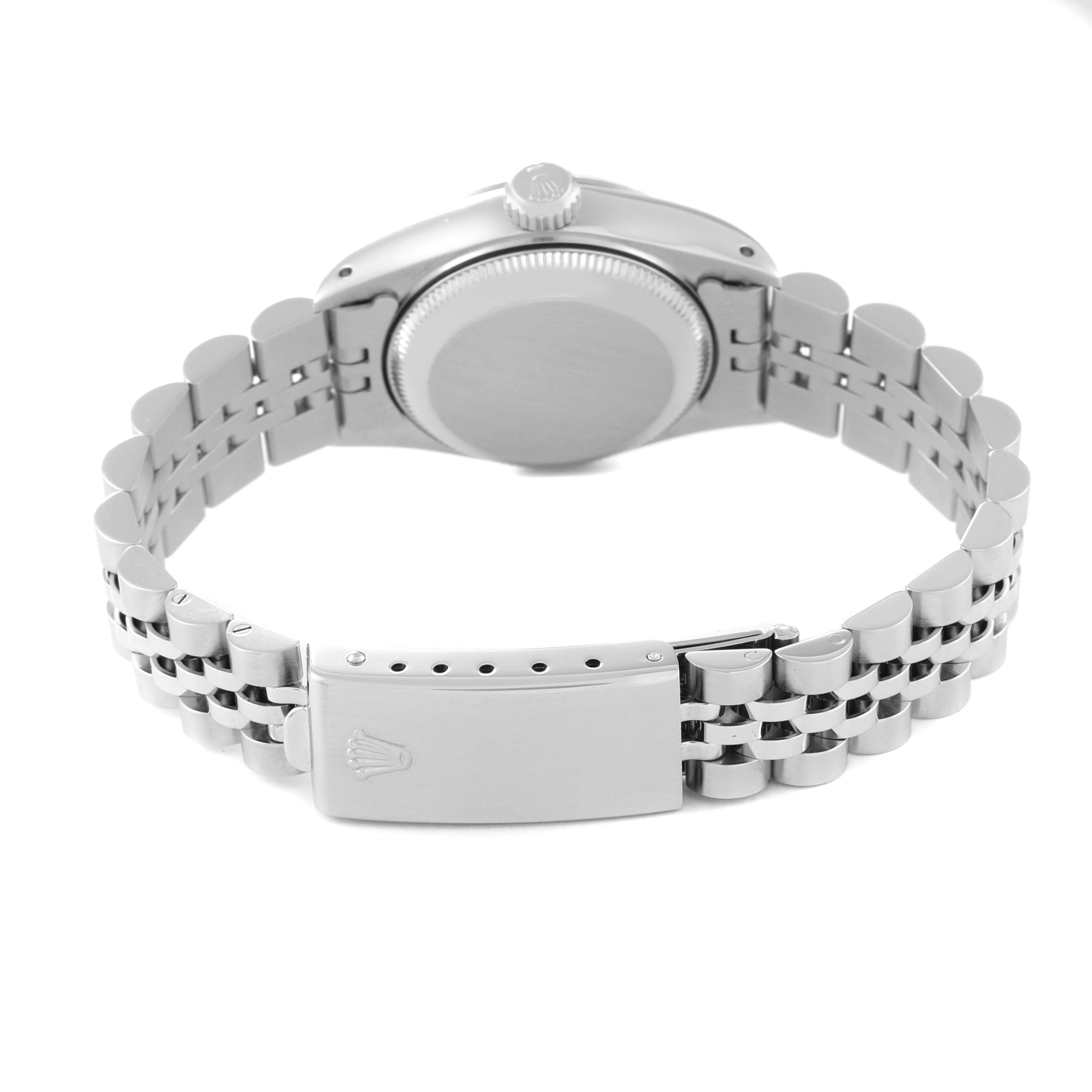 The image shows the back view of a Rolex Datejust 69174 Women's Stainless Steel Silver Dial 69174 Women's Stainless Steel Silver Dial watch, featuring its case back, crown, and Jubilee bracelet with clasp.