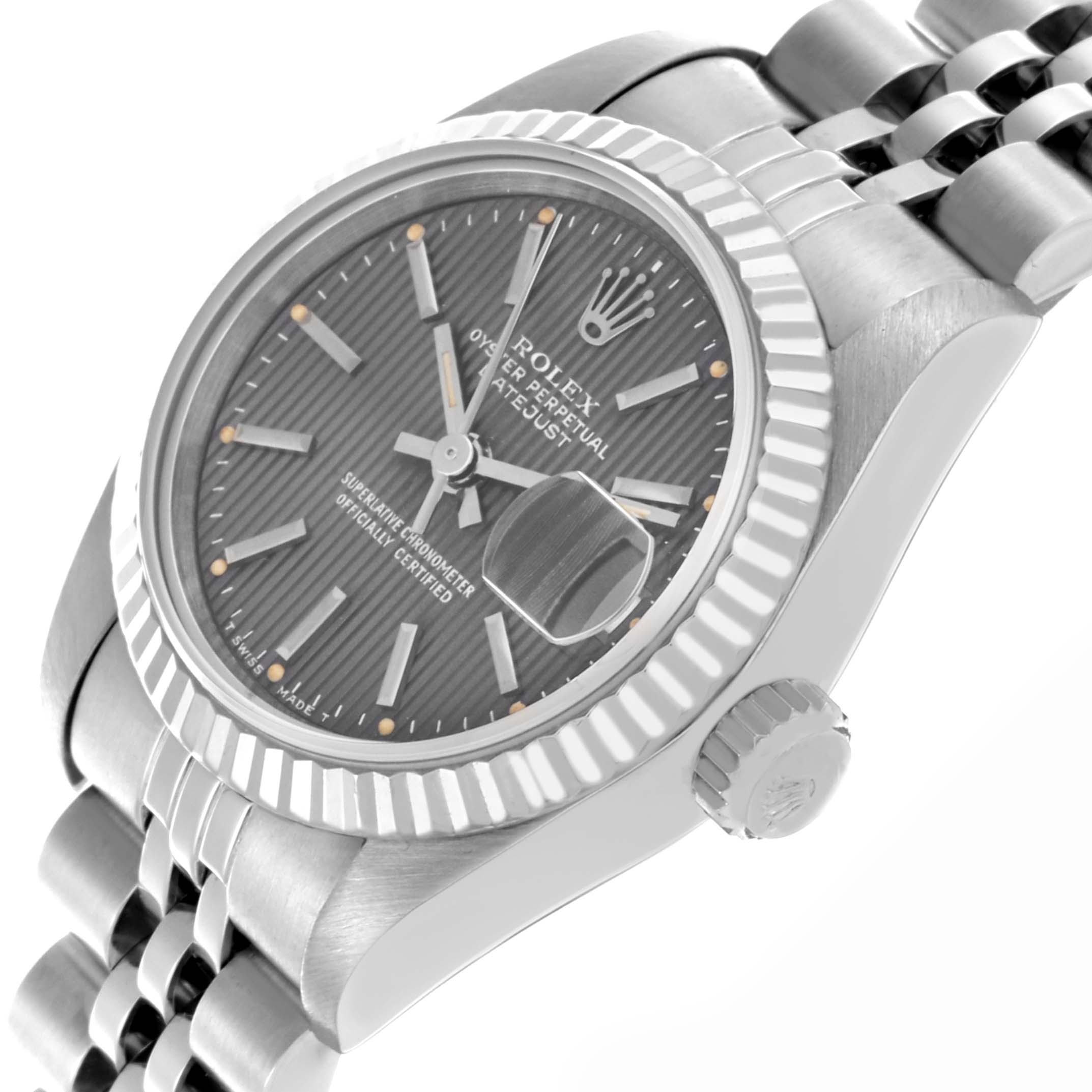 The Rolex Datejust 69174 Women's Stainless Steel Grey Dial 69174 Women's Stainless Steel Grey Dial watch is shown at a slight angle, displaying its face, fluted bezel, crown, and part of the bracelet.