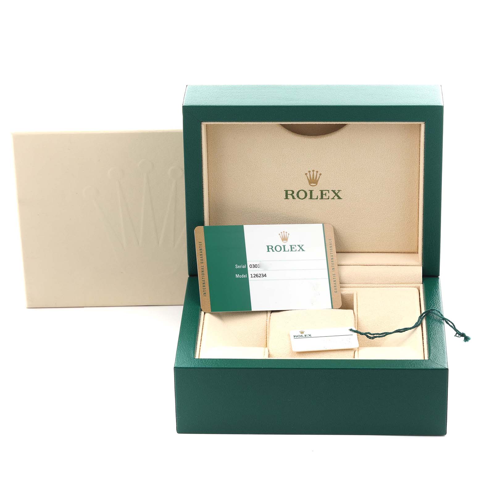 The image shows a Rolex Datejust 126234 Men's Stainless Steel Silver Dial 126234 Men's Stainless Steel Silver Dial box and accessories, including a serial card and a tag, from a front angle.