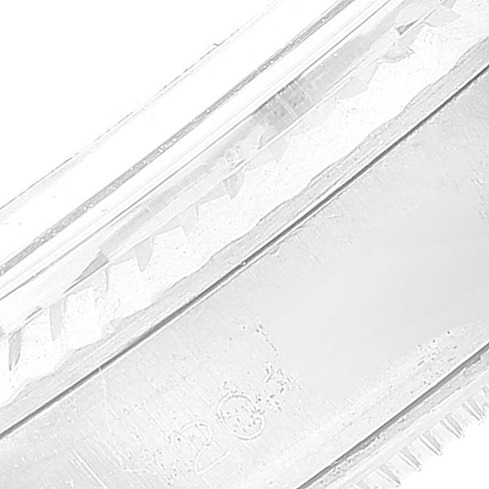 This image is a close-up of the bezel and edge of the dial from a Rolex Vintage Collection 1601 Men's Stainless Steel Silver Dial 1601 Men's Stainless Steel Silver Dial watch.