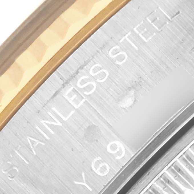 The image shows a close-up of the bezel and casing of a Rolex Datejust 79173 Women's Steel and Gold (two tone) Blue Dial 79173 Women's Steel and Gold (two tone) Blue Dial, highlighting the stainless steel material.