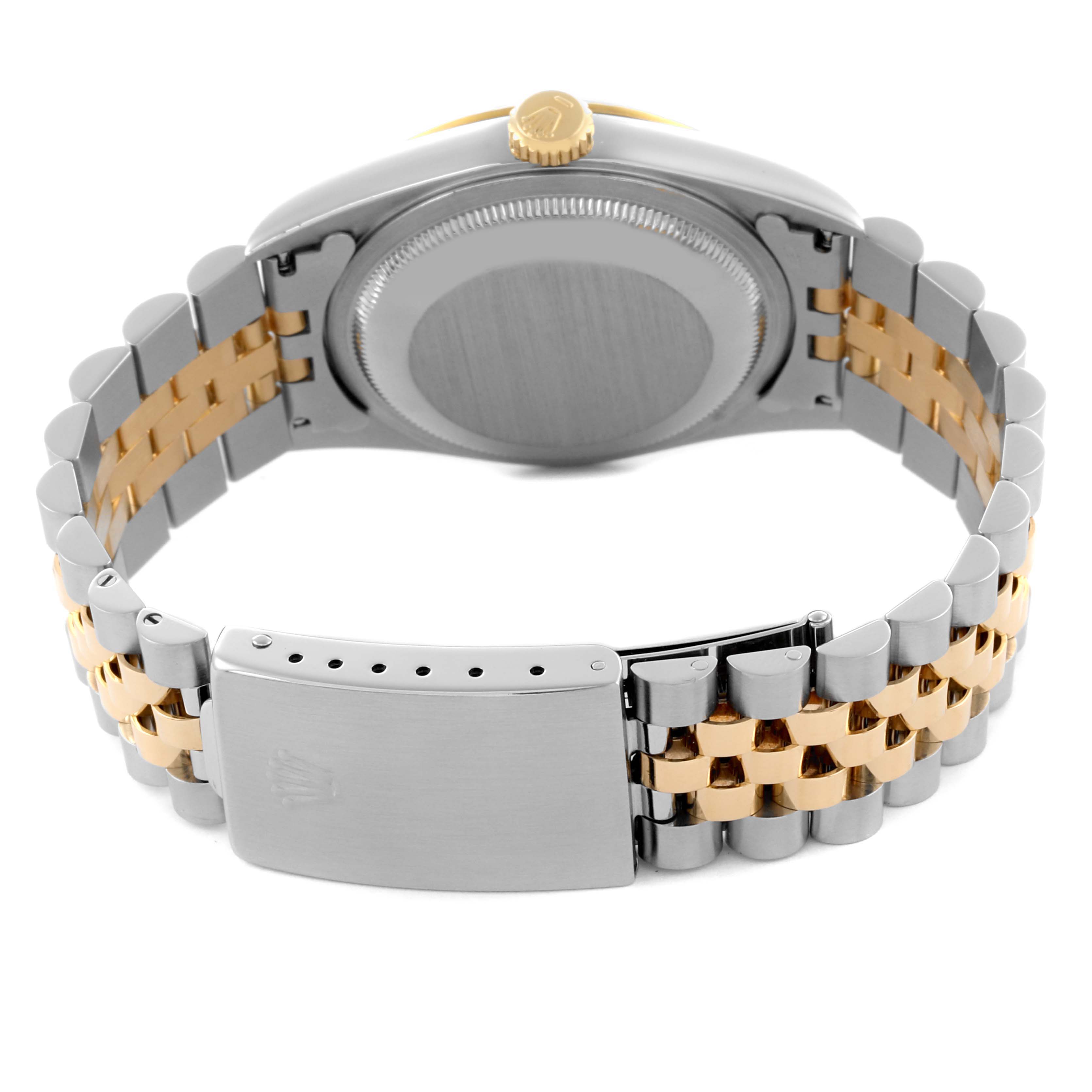 The image shows the back view of a Rolex Datejust 16233 Men's Steel and Gold (two tone) Beige Dial 16233 Men's Steel and Gold (two tone) Beige Dial, highlighting the bracelet, clasp, and case back.