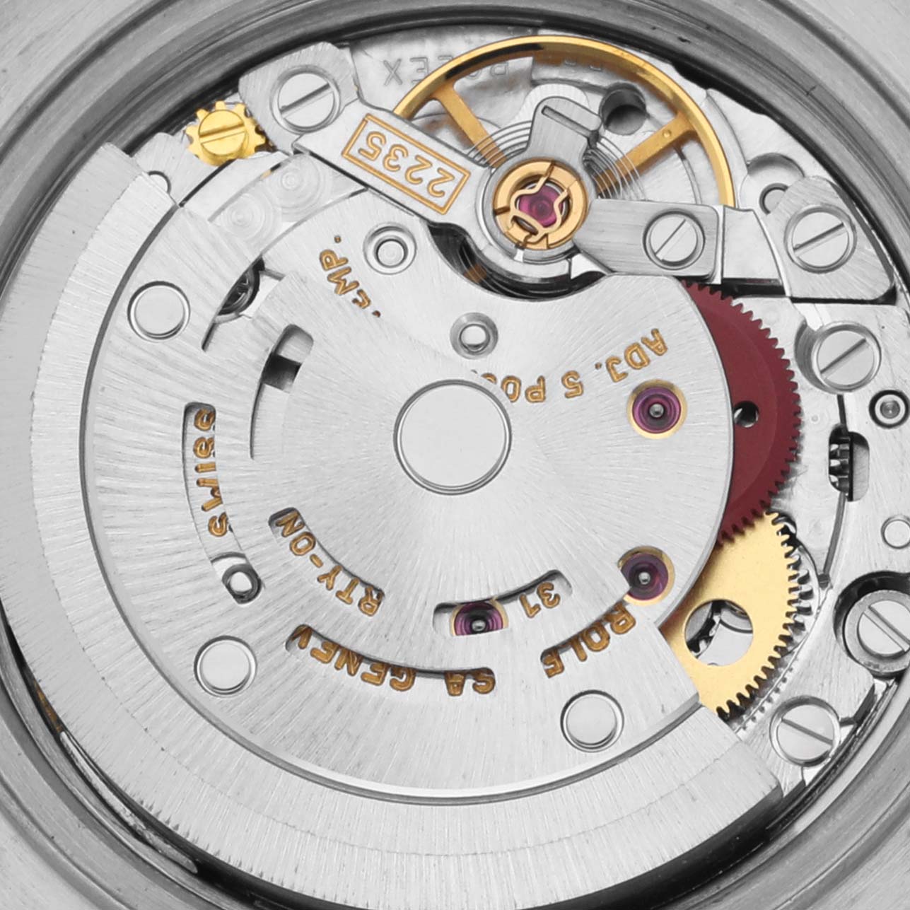 The image shows the movement mechanism of a Rolex Datejust 79173 Women's Steel and Gold (two tone) White Dial 79173 Women's Steel and Gold (two tone) White Dial, highlighting gears and components from a top-down angle.