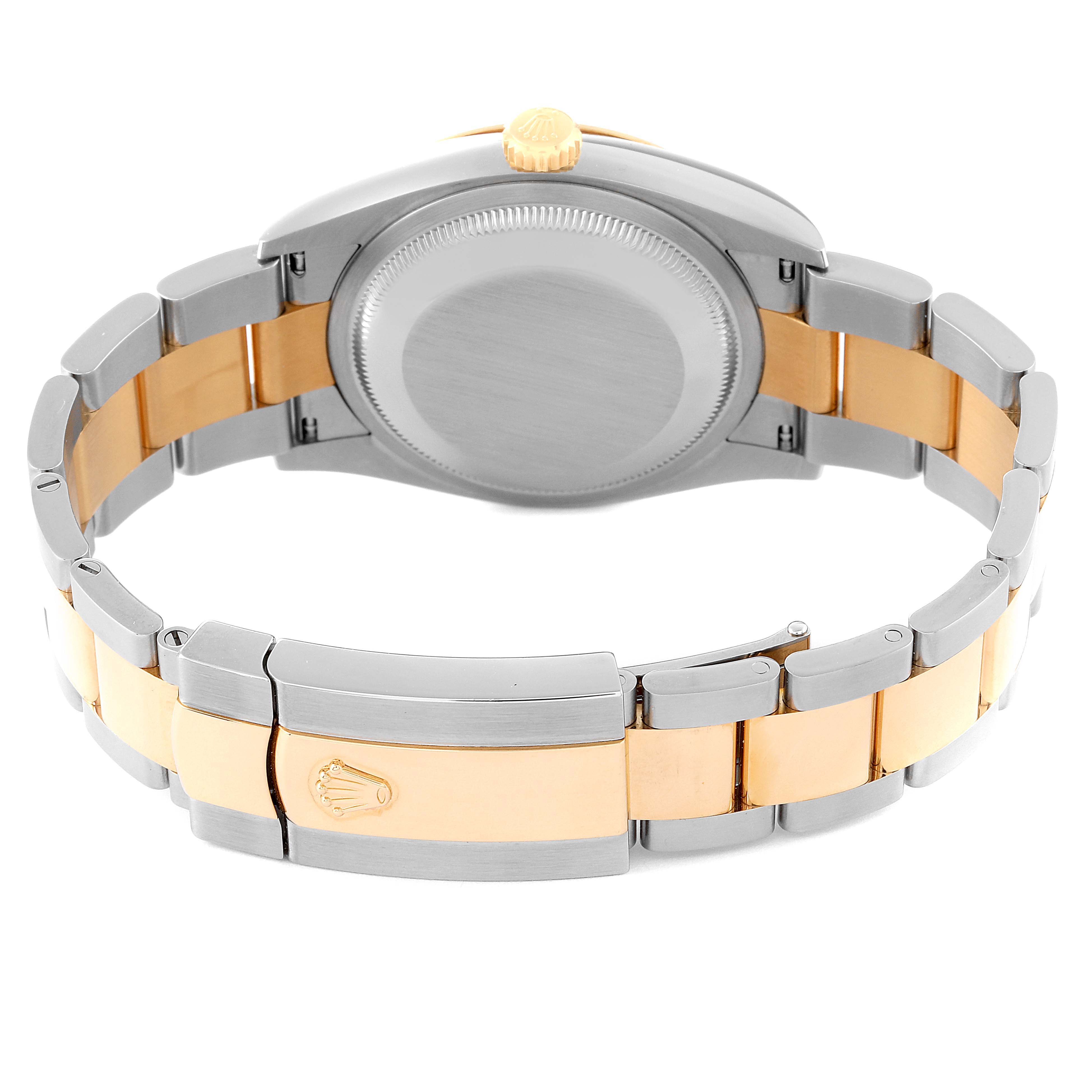 The image shows the back and bracelet of a Rolex Datejust 126203 Men's Steel and Gold (two tone) White Dial 126203 Men's Steel and Gold (two tone) White Dial watch, highlighting its two-tone metal design.