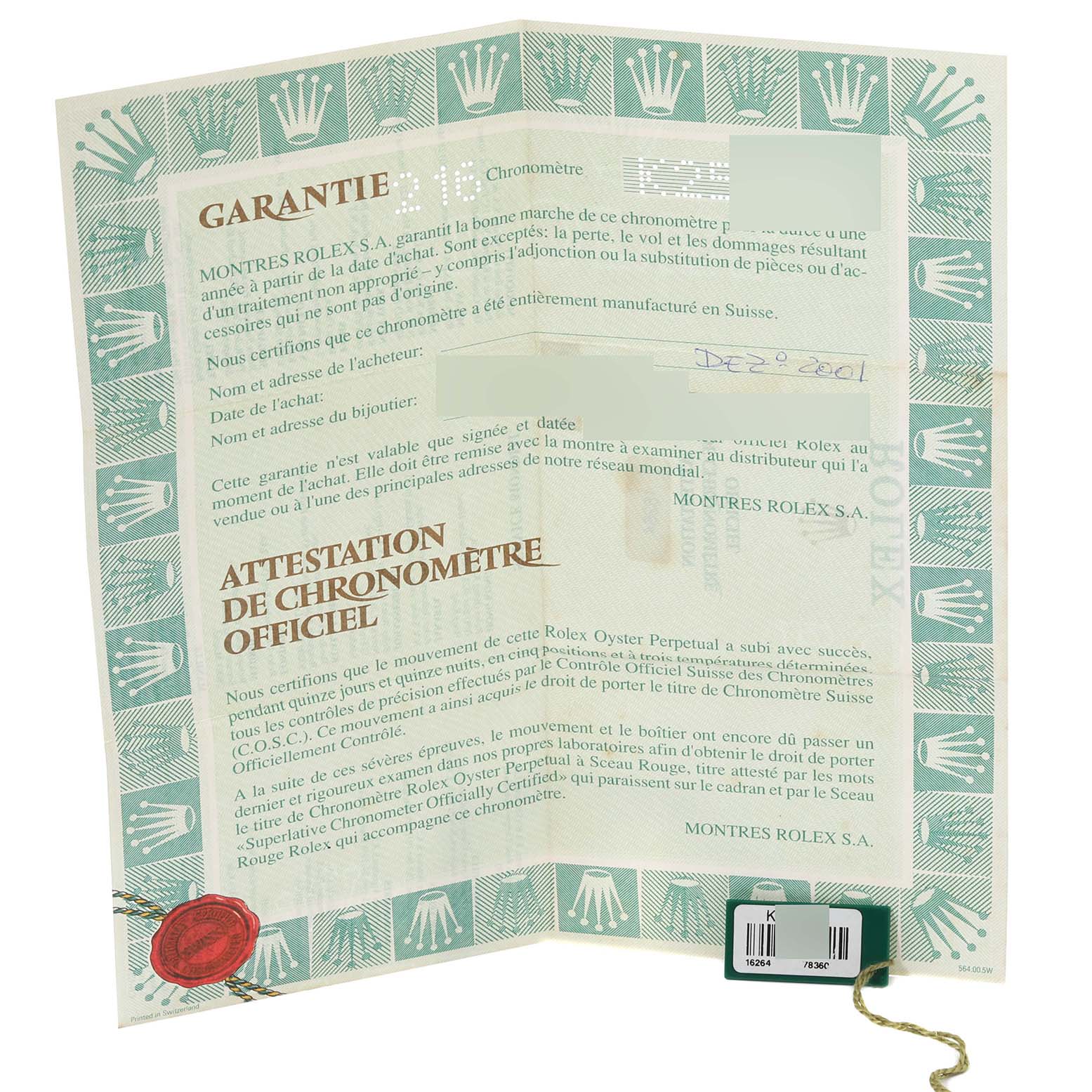 This is an image of a warranty card for a Rolex Turn-o-Graph 16264 Men's Stainless Steel Black Dial 16264 Men's Stainless Steel Black Dial model, shown at a slight angle with green and gold detailing.