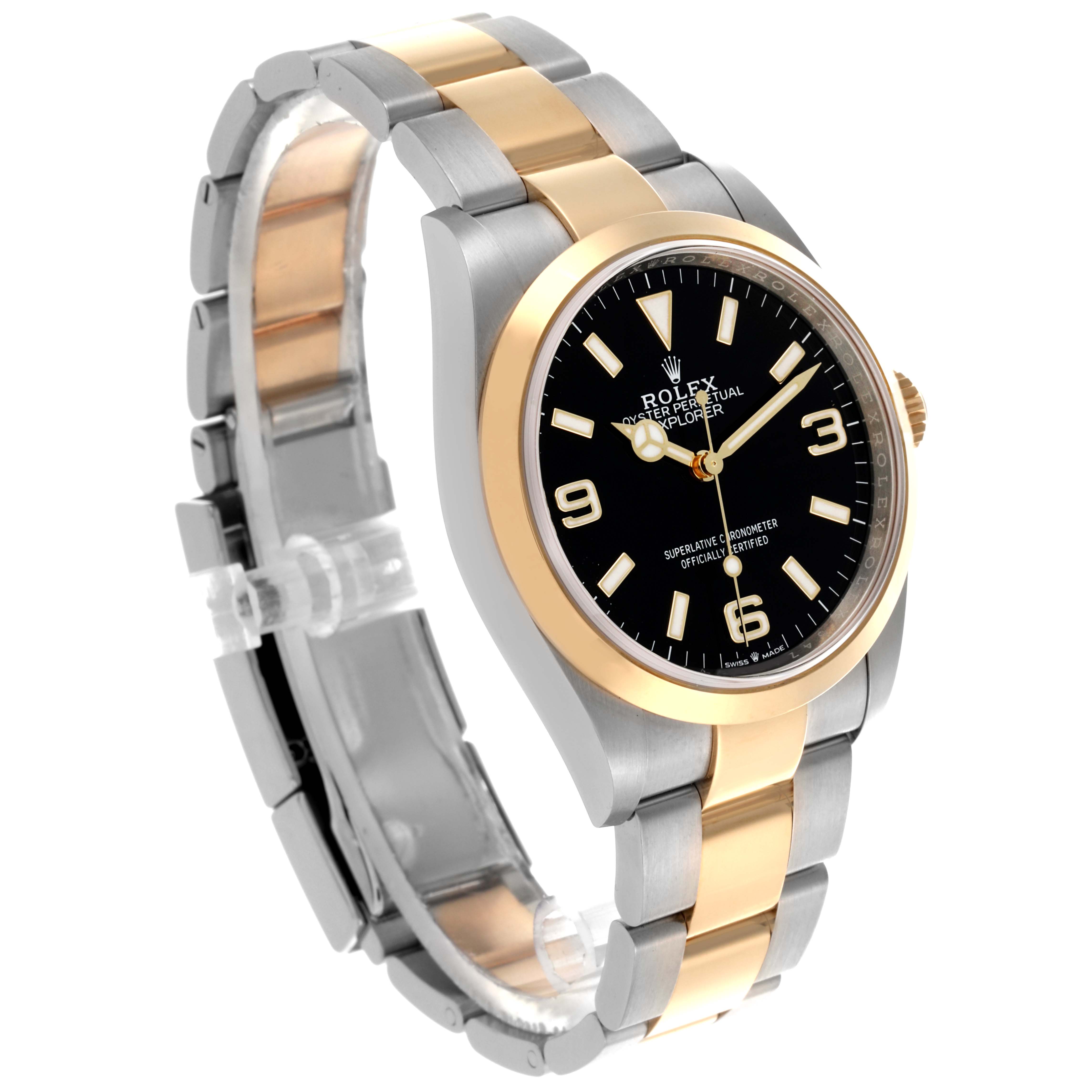 The Rolex Explorer 124273 Men's Steel and Gold (two tone) Black Dial 124273 Men's Steel and Gold (two tone) Black Dial watch is shown at a three-quarter angle, displaying the dial, bezel, and part of the bracelet.