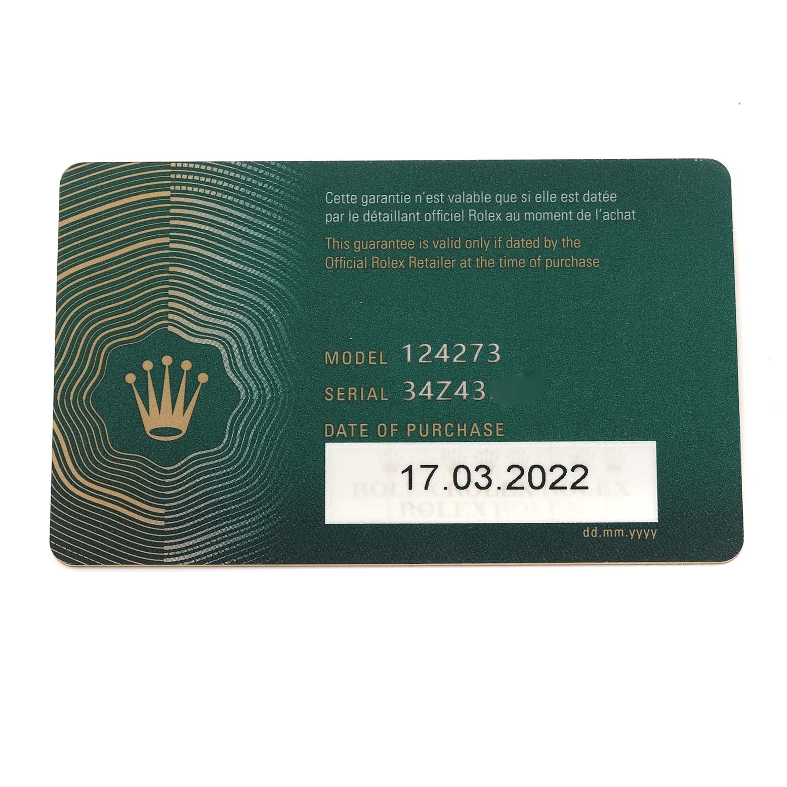 The image shows a warranty card for the Rolex Explorer 124273 Men's Steel and Gold (two tone) Black Dial 124273 Men's Steel and Gold (two tone) Black Dial watch, detailing model and serial numbers.