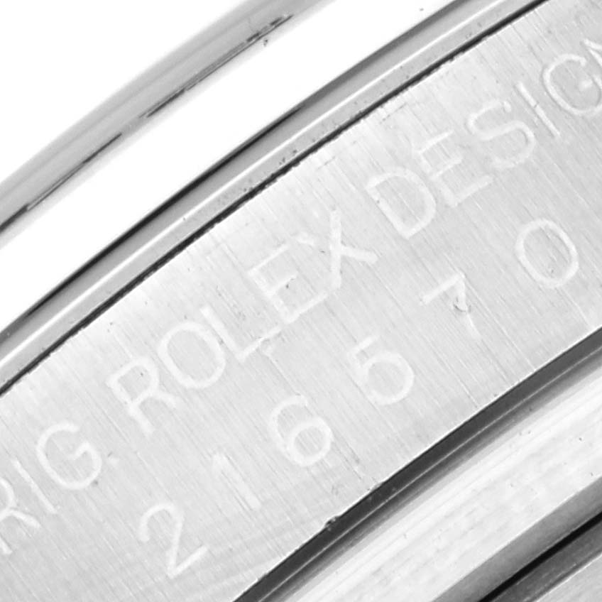 This is a close-up of the Rolex Explorer 216570 Men
s Stainless Steel White Dial 216570 Men
s Stainless Steel White Dial model, focusing on the engraved case back.