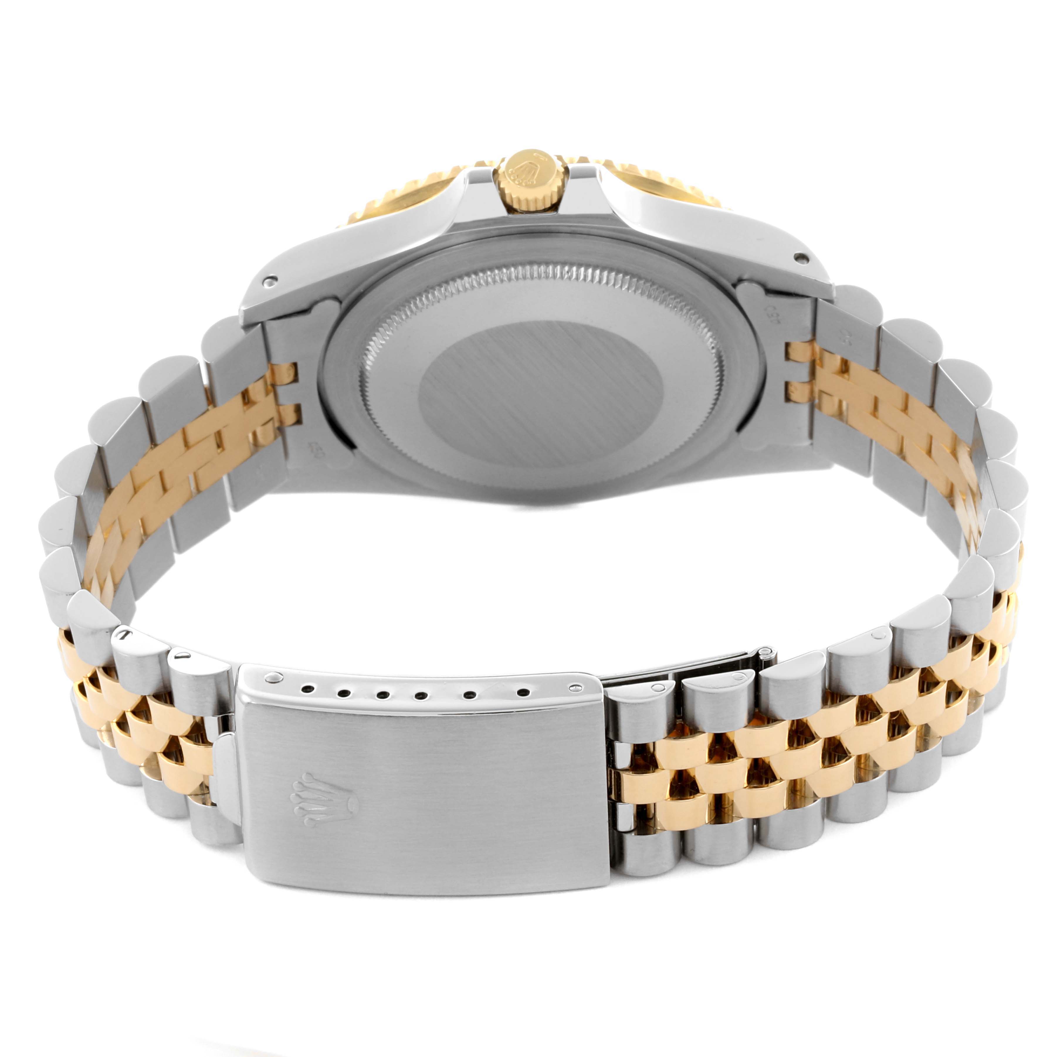 The image shows the backside of a Rolex GMT-Master 16753 Men's Steel and Gold (two tone) Black Dial 16753 Men's Steel and Gold (two tone) Black Dial watch, highlighting the case back and two-tone bracelet with clasp.