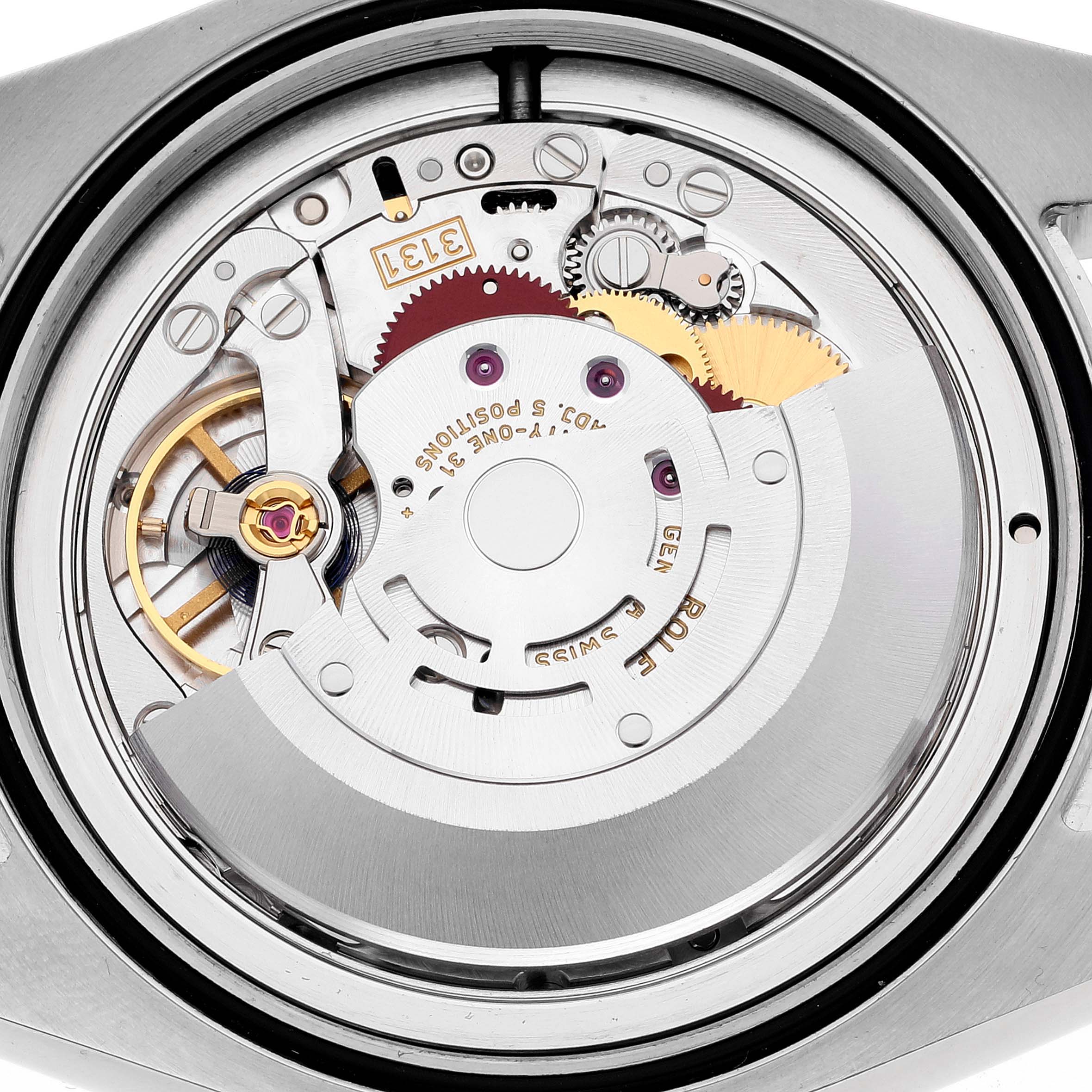 The image shows the inner mechanism of a Rolex Air-King 116900 Men's Stainless Steel Black Dial 116900 Men's Stainless Steel Black Dial watch from a top-down angle.