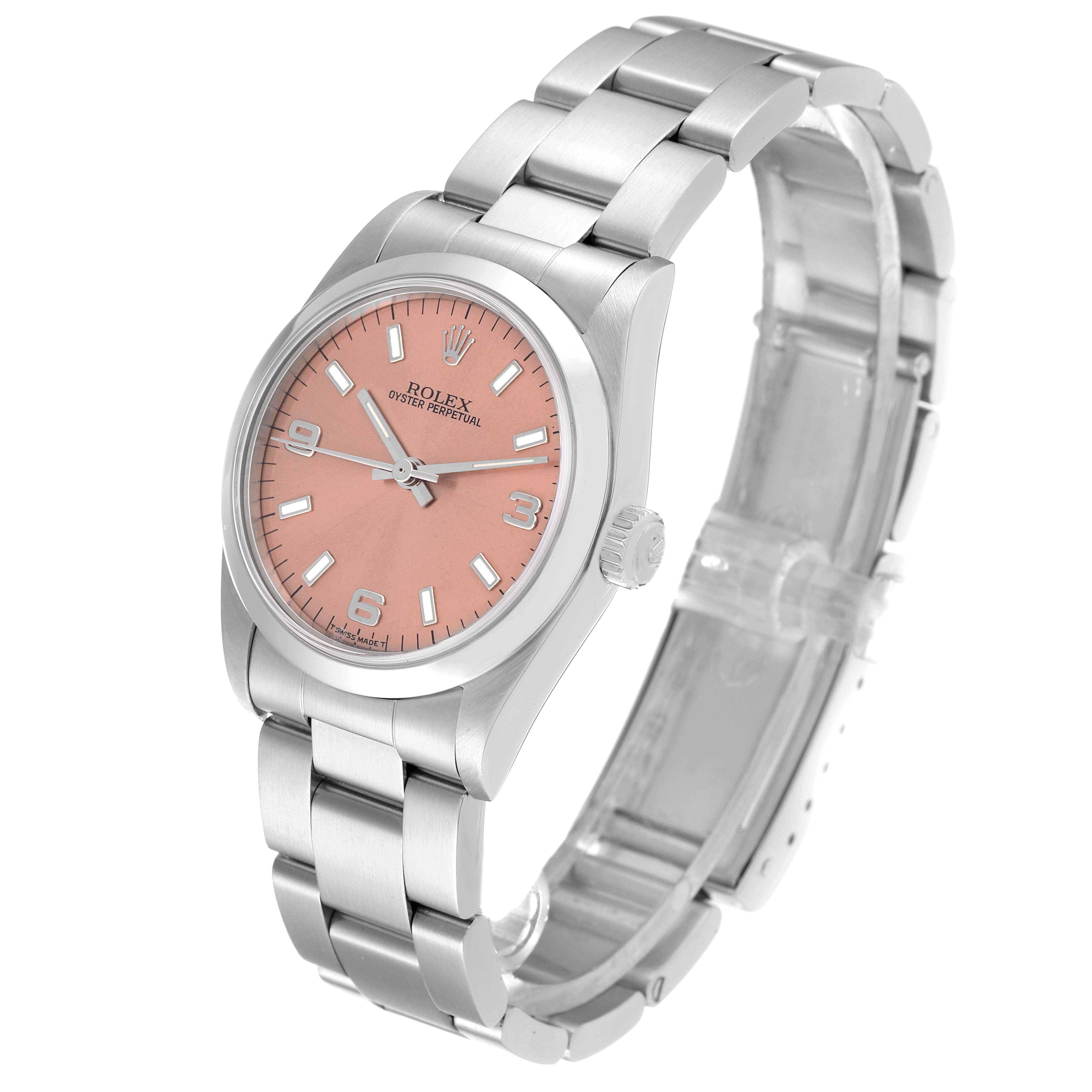 This image shows a Rolex Mid-Size 77080 Women's Stainless Steel Pink Dial 77080 Women's Stainless Steel Pink Dial Oyster Perpetual watch from an angled view, displaying its face, case, and bracelet.