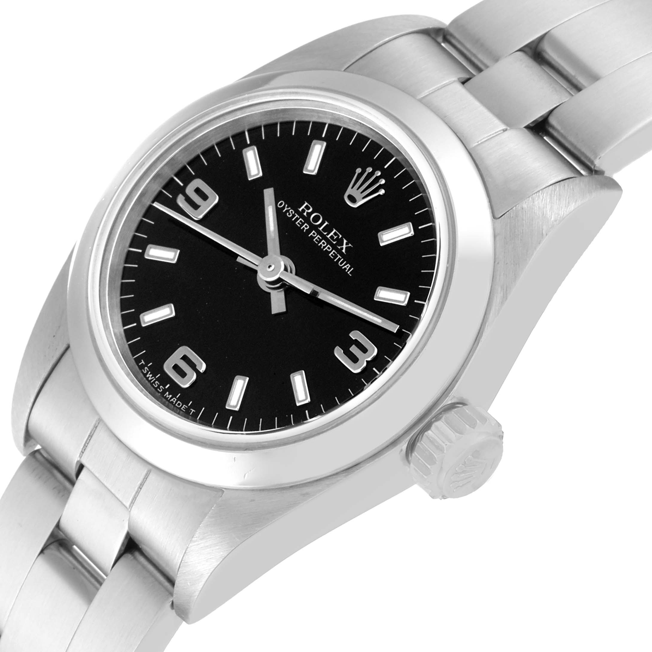 The Rolex Oyster Perpetual 67180 Women's Stainless Steel Black Dial 67180 Women's Stainless Steel Black Dial watch is shown at an angled side view, highlighting the dial, bezel, crown, and part of the metal bracelet.