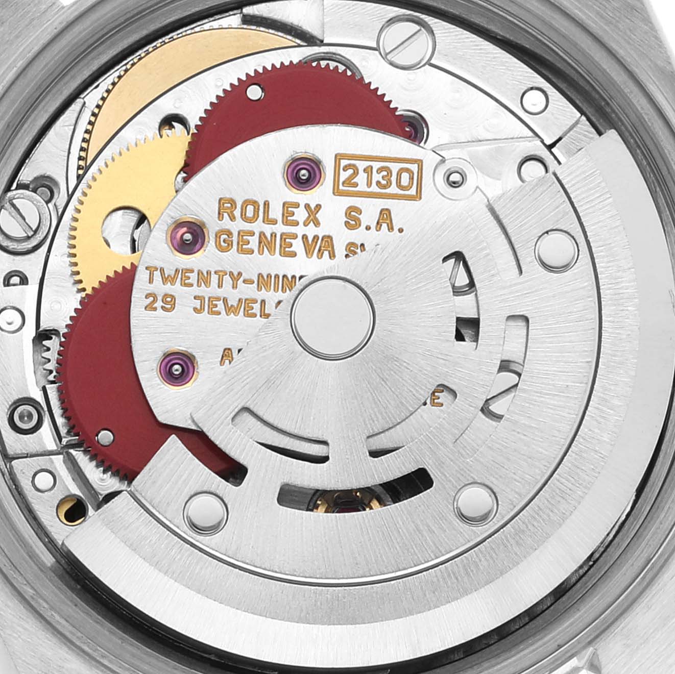This image shows the inner mechanical movements, specifically the rotor and gears, of a Rolex Oyster Perpetual 67180 Women's Stainless Steel Black Dial 67180 Women's Stainless Steel Black Dial watch.