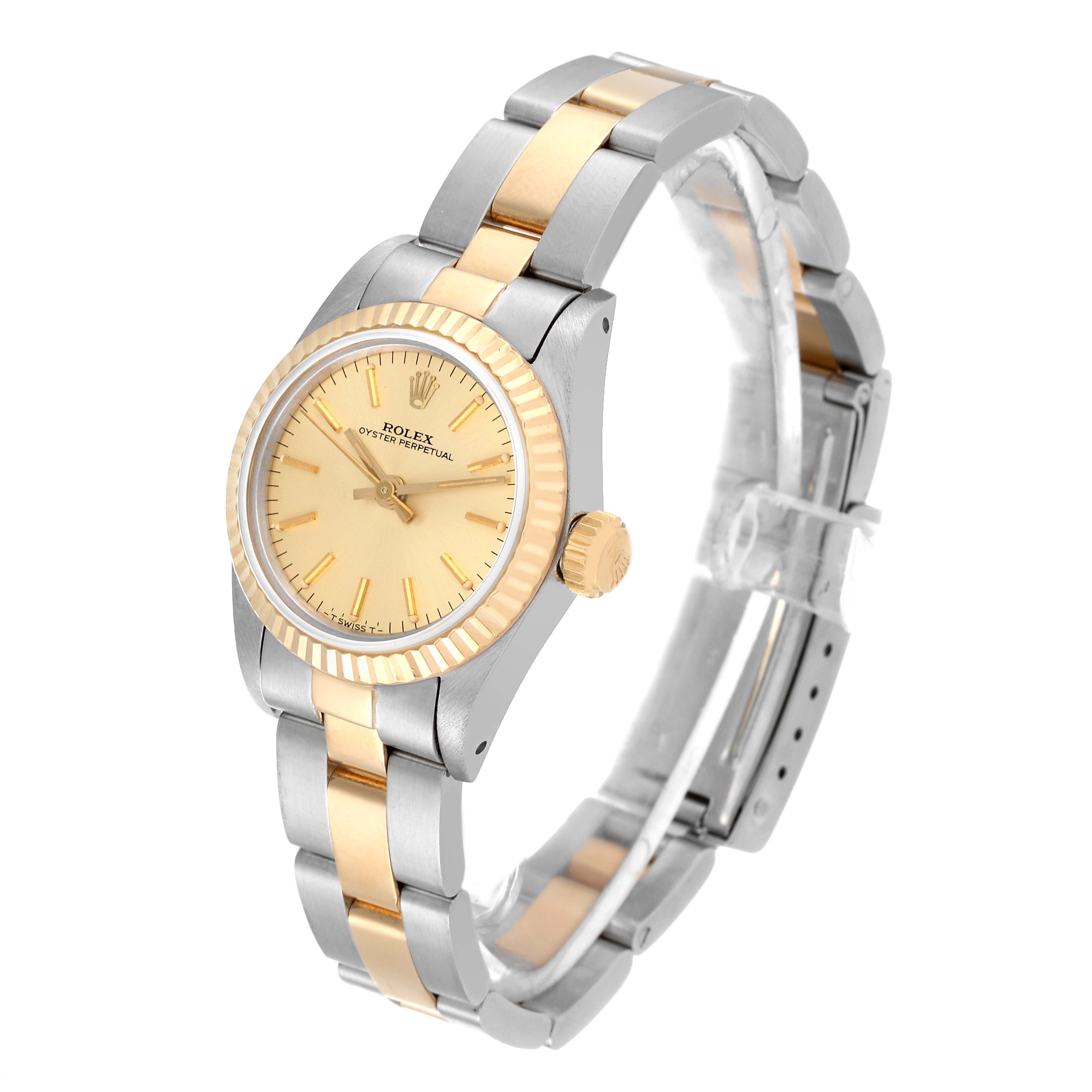 The image shows a side-view angle of a Rolex Oyster Perpetual 67193 Women's Steel and Gold (two tone) Champagne Dial 67193 Women's Steel and Gold (two tone) Champagne Dial watch displaying the face, bezel, and bracelet.