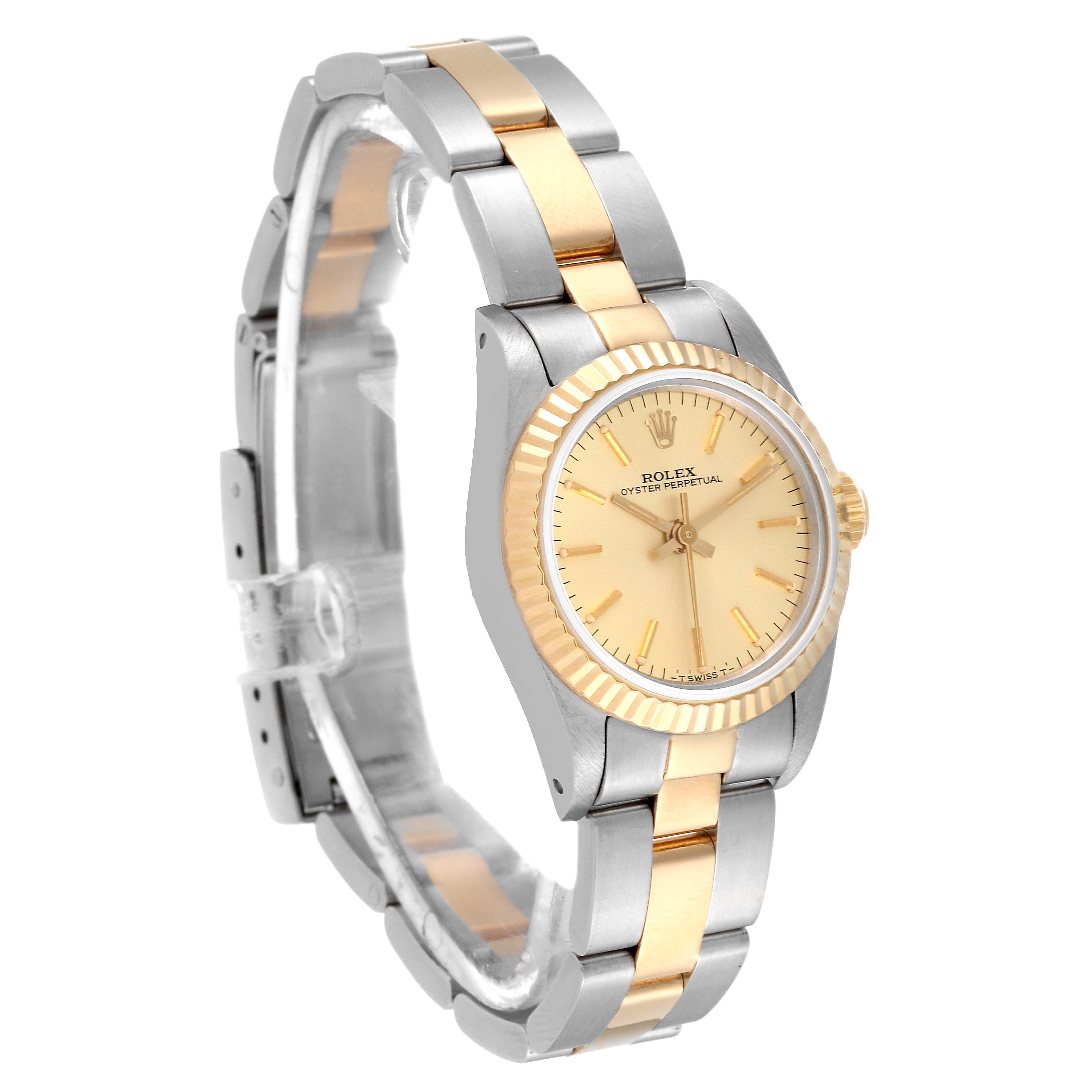 The image shows a Rolex Oyster Perpetual 67193 Women's Steel and Gold (two tone) Champagne Dial 67193 Women's Steel and Gold (two tone) Champagne Dial watch angled to display its face, bracelet, and fluted bezel.