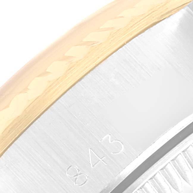 The image shows a close-up of the bezel and case side of a Rolex Oyster Perpetual 67193 Women's Steel and Gold (two tone) Champagne Dial 67193 Women's Steel and Gold (two tone) Champagne Dial watch, including engraved numbers.