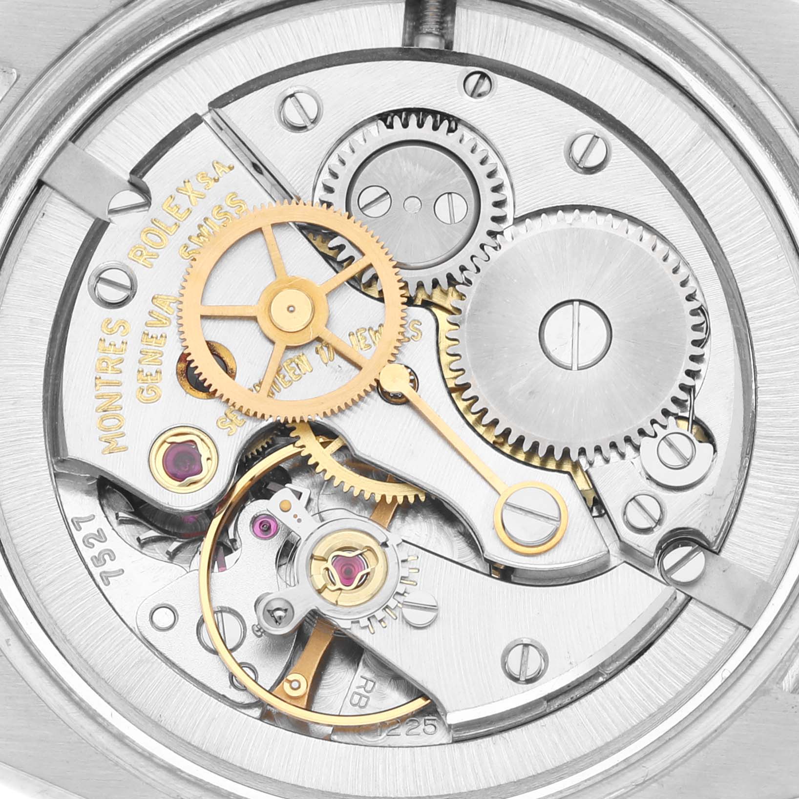 The image shows the intricate internal mechanism of the Vintage Collection model by Rolex, highlighting gears and precision components.